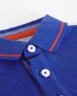 Polo's - Felblauwe polo met patches