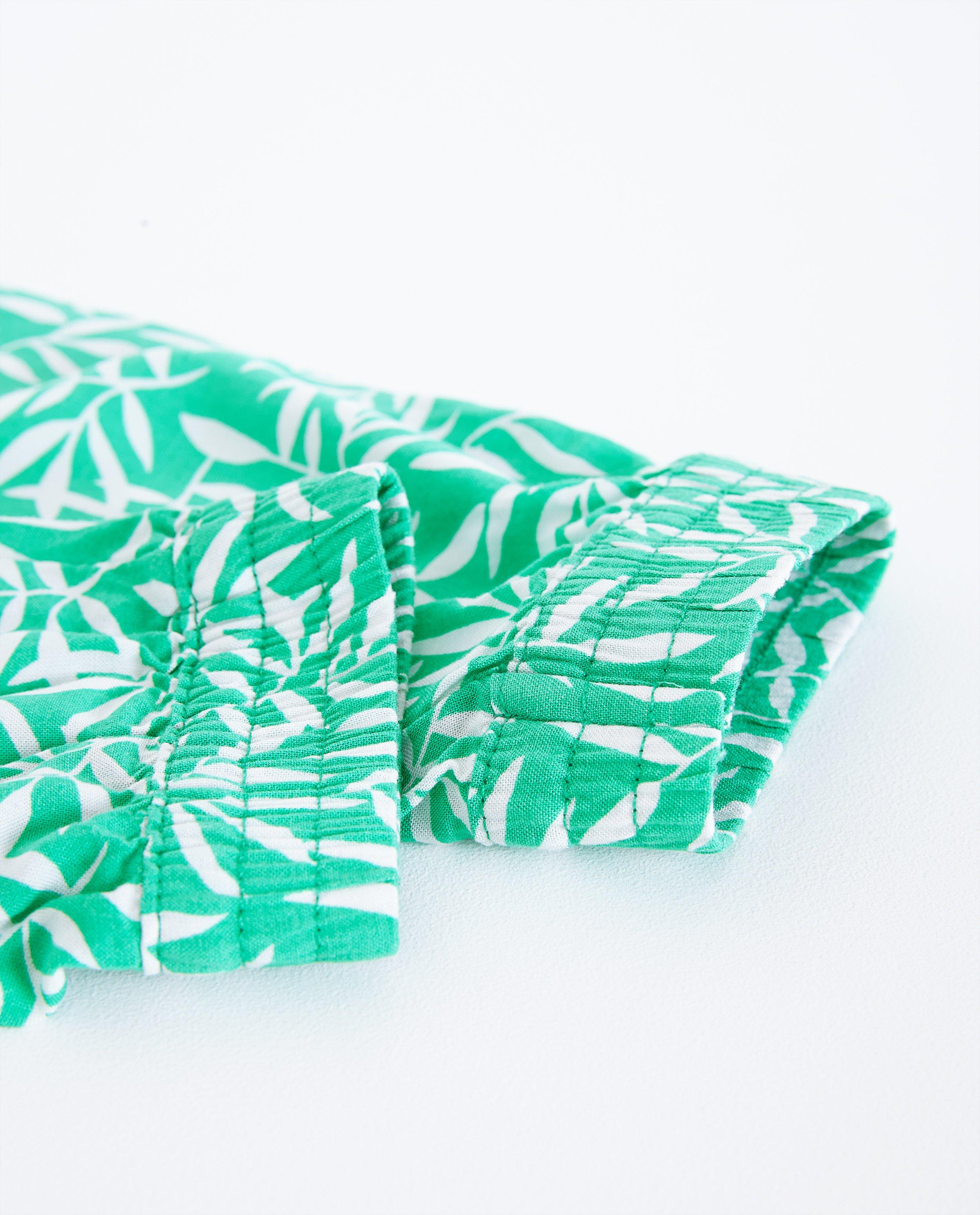 Broeken - Felgroene broek met bladerprint