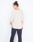 T-shirts - Zandkleurige blouse met glitterprint