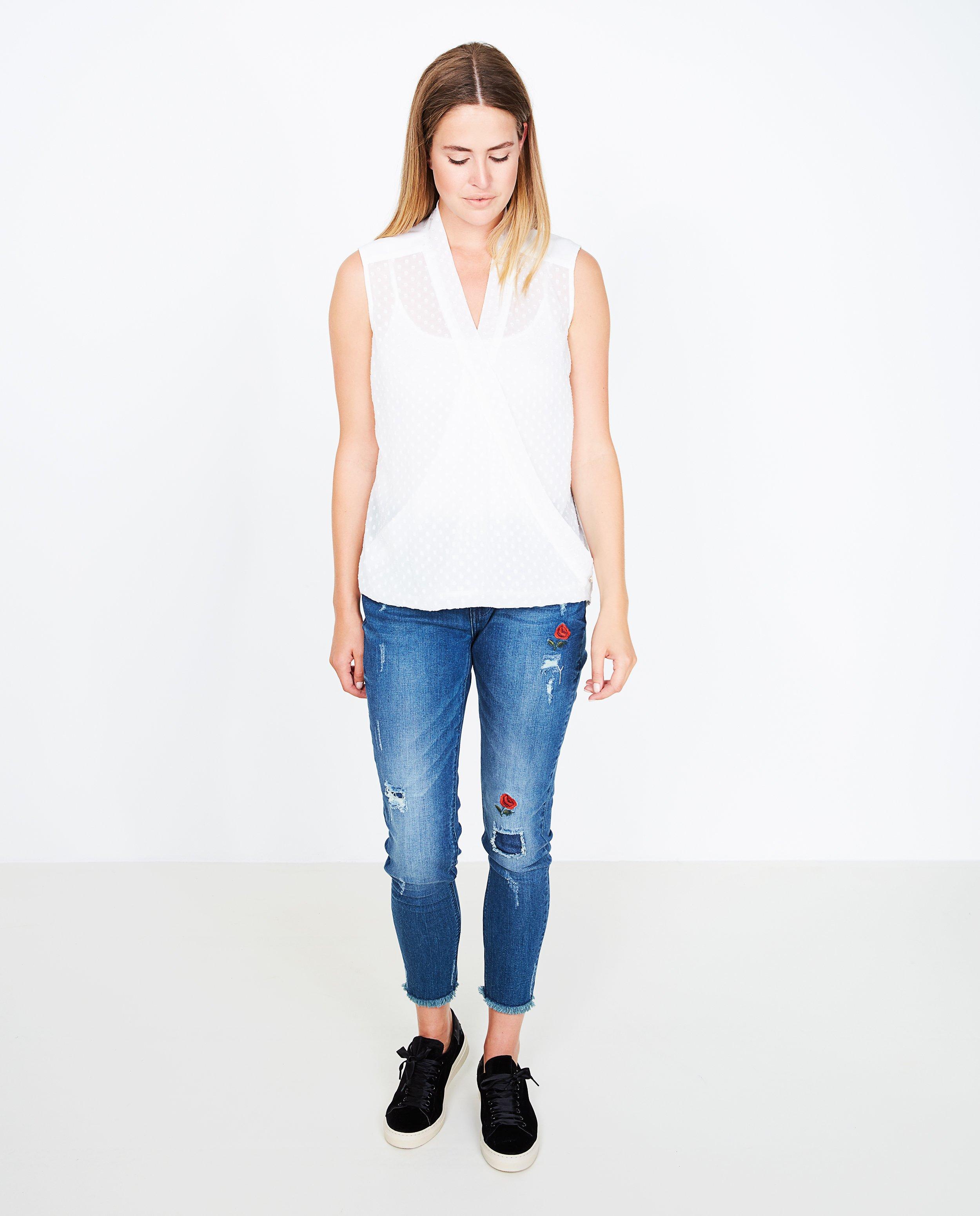 Witte wikkelblouse - met bolletjesprint - JBC