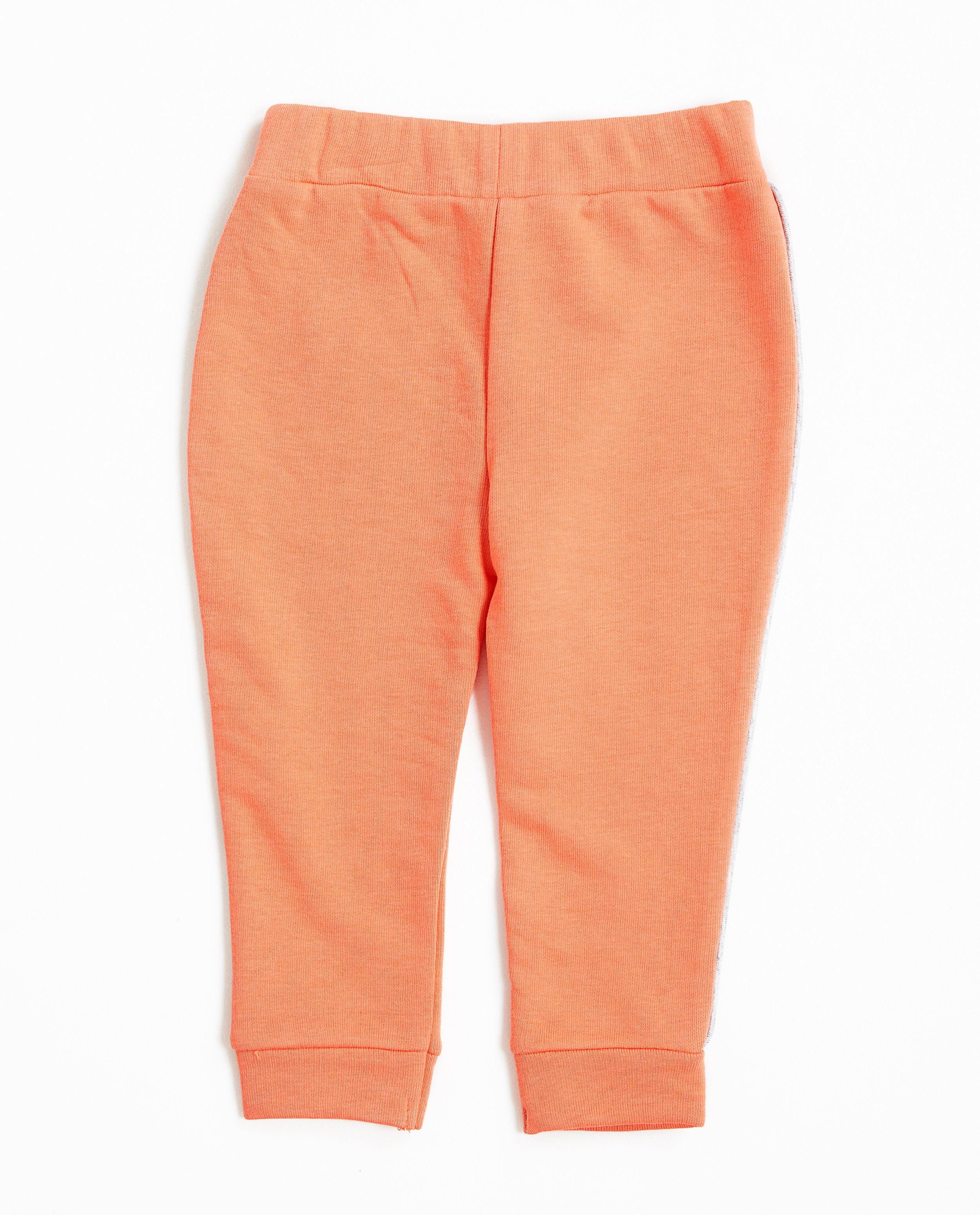 Pantalons - Fluo oranje sweatbroek