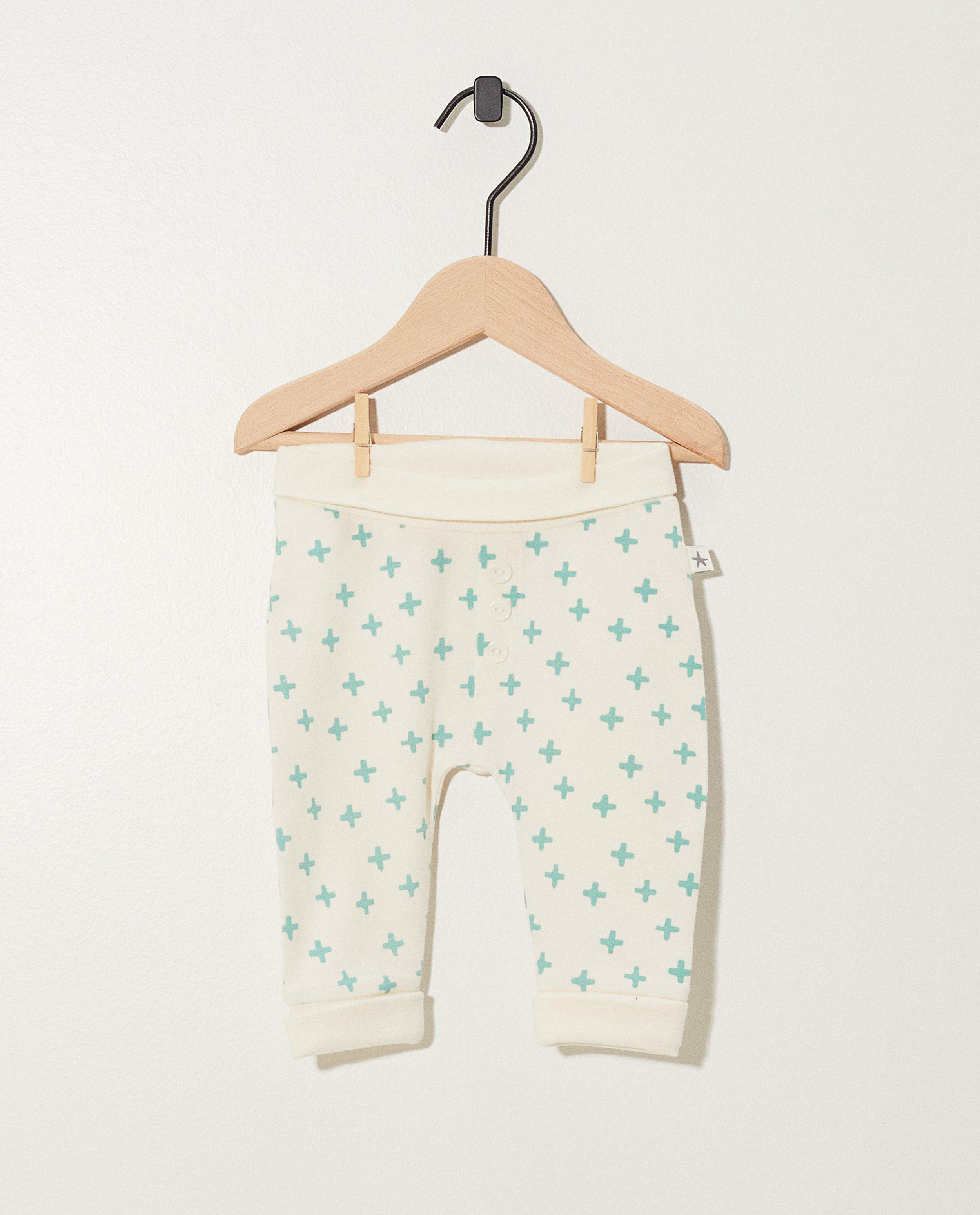 meegroeibroekje van biokatoen - in wit en blauwgroen - Newborn 50-68