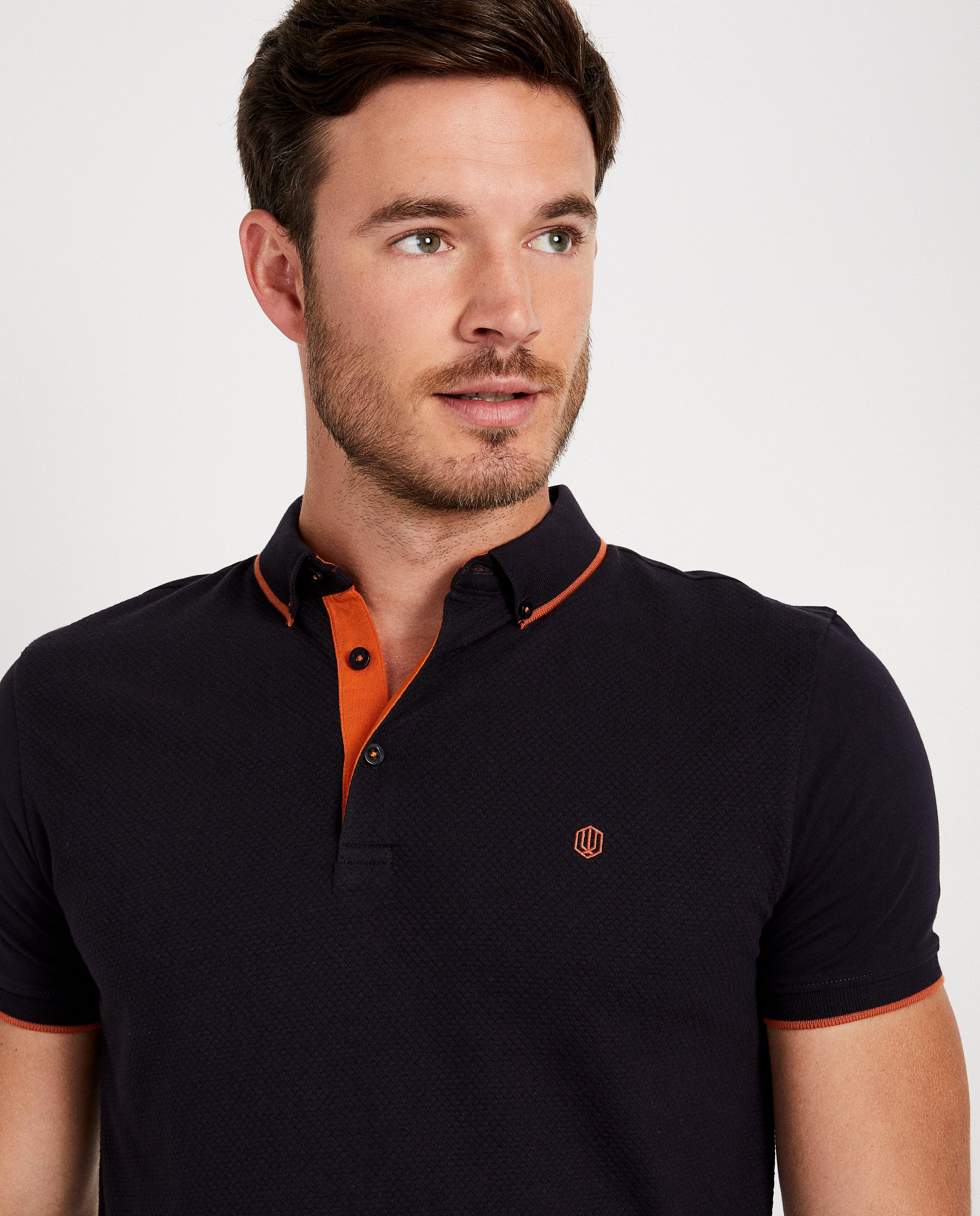 Polos - Polo bleu, motif en relief