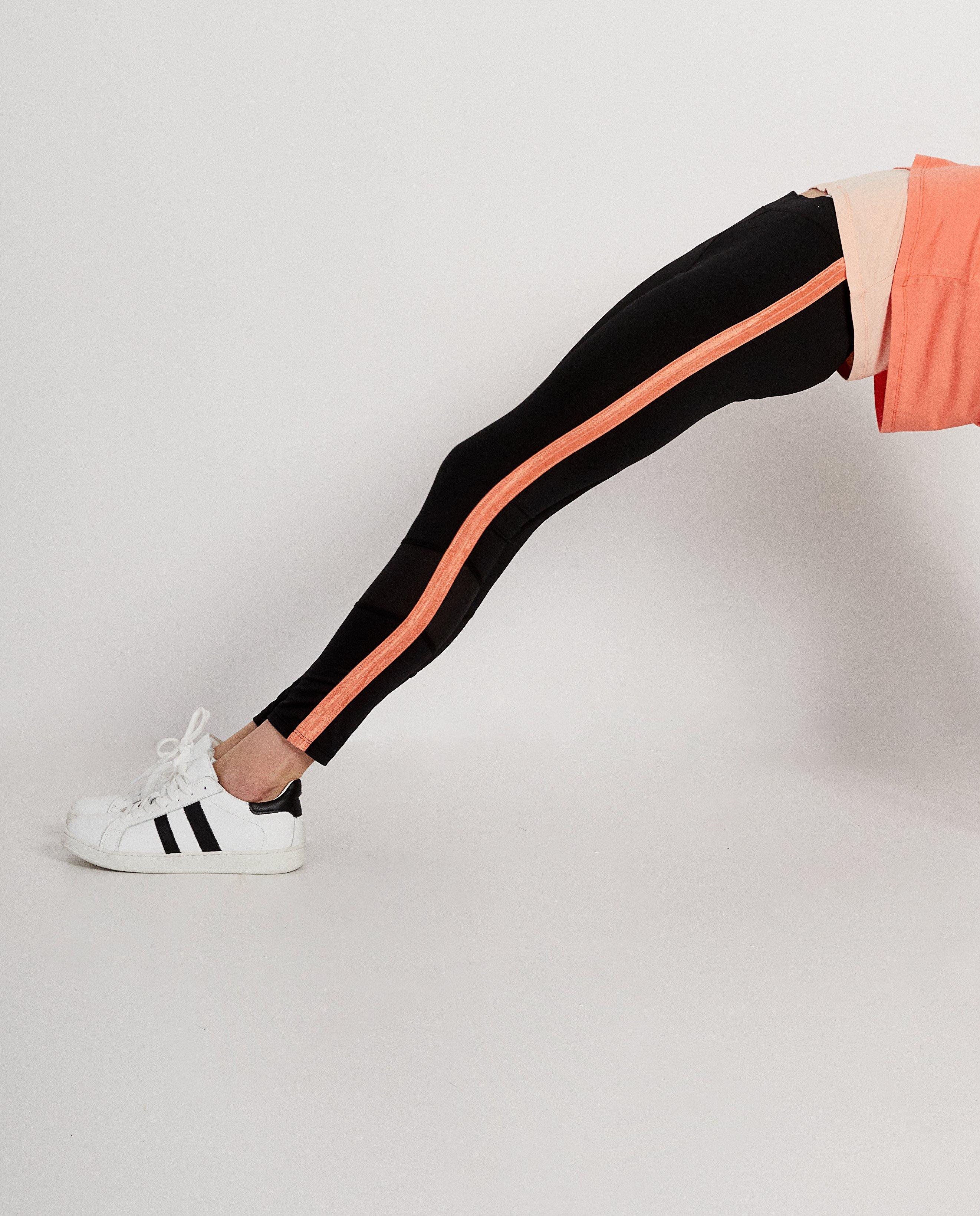 Leggings - Zwarte legging met roze streep