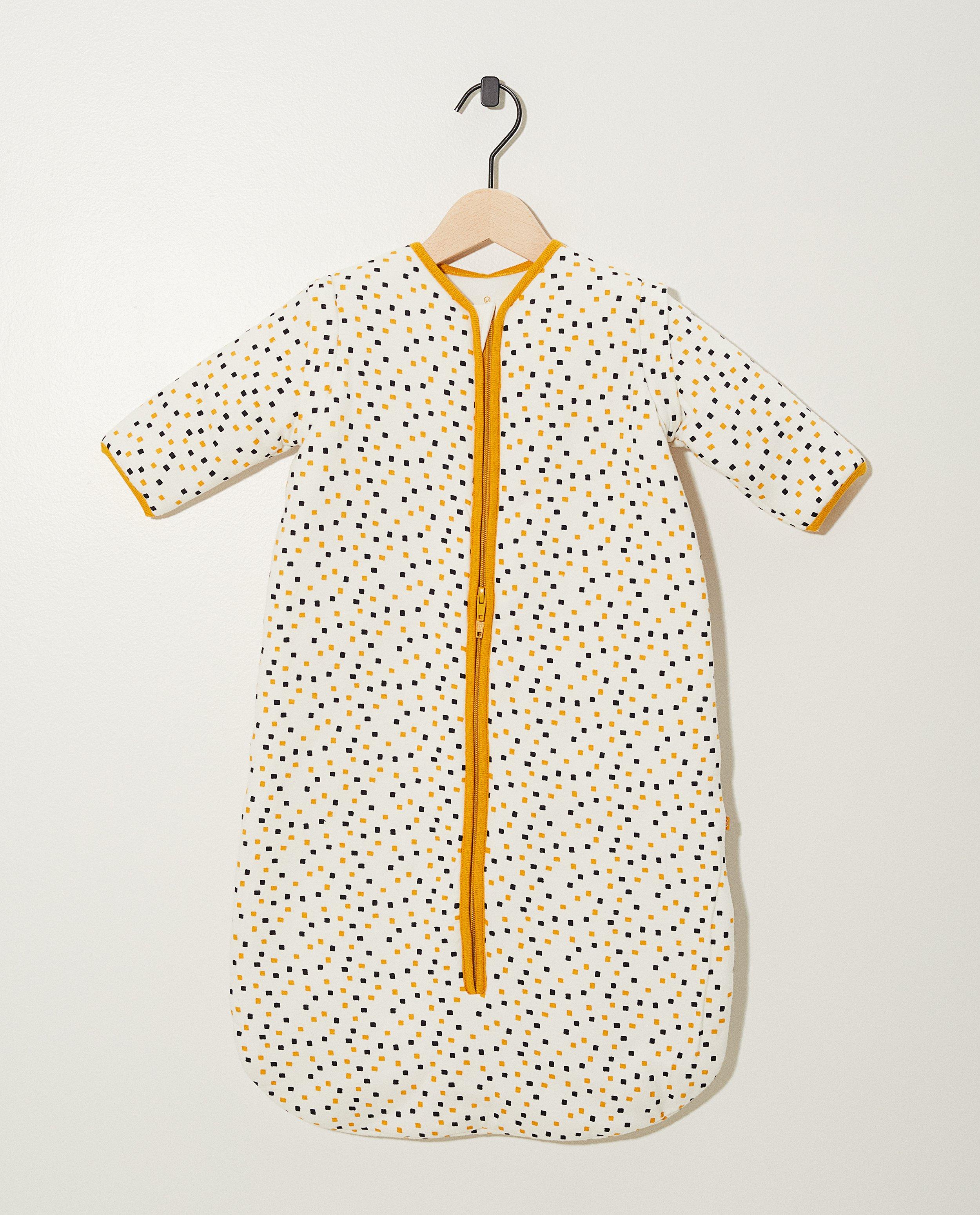 Witte slaapzak van biokatoen - met allover print - Cuddles and Smiles