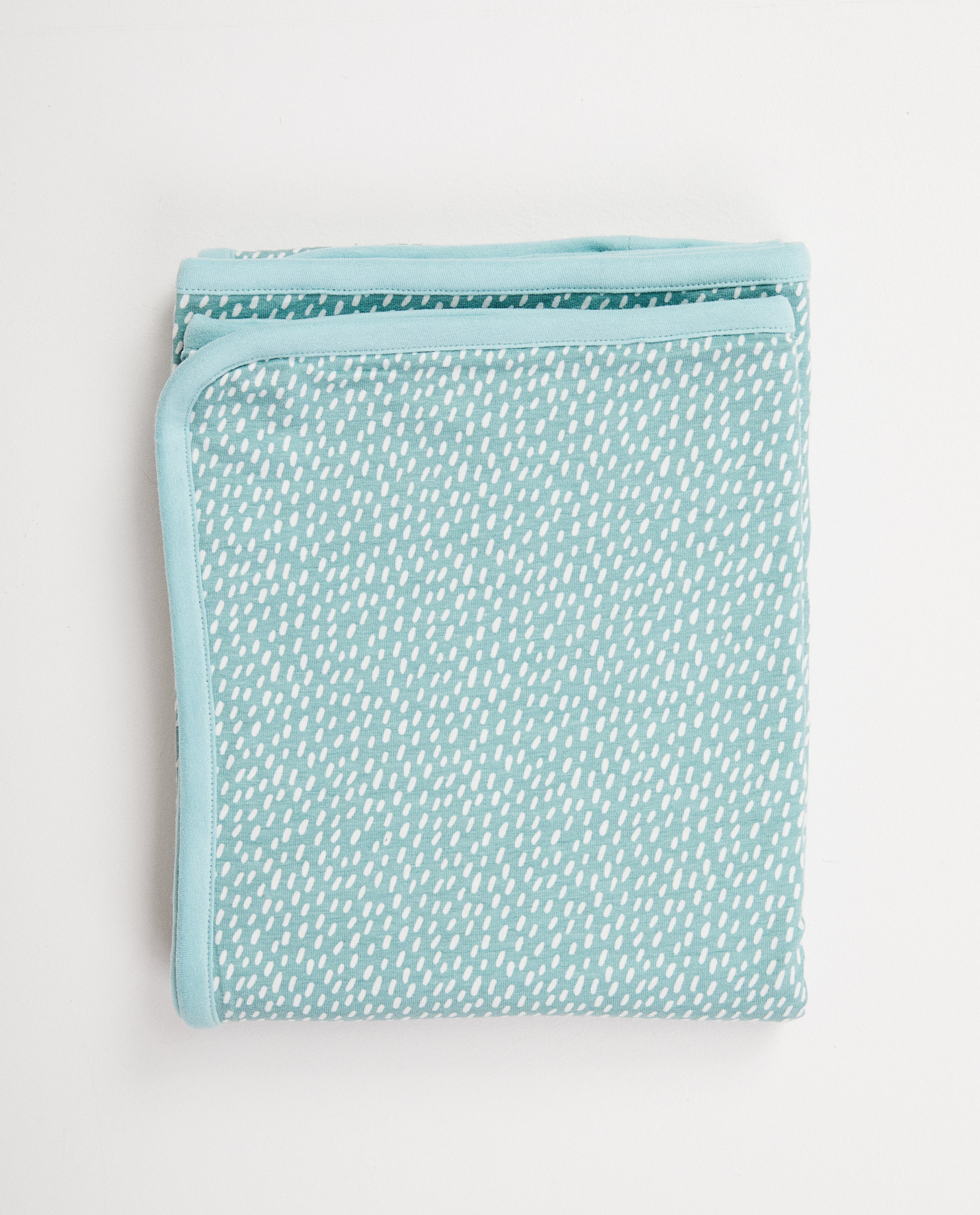 Couverture bleu clair en coton bio - deux côtés - Cuddles and Smiles