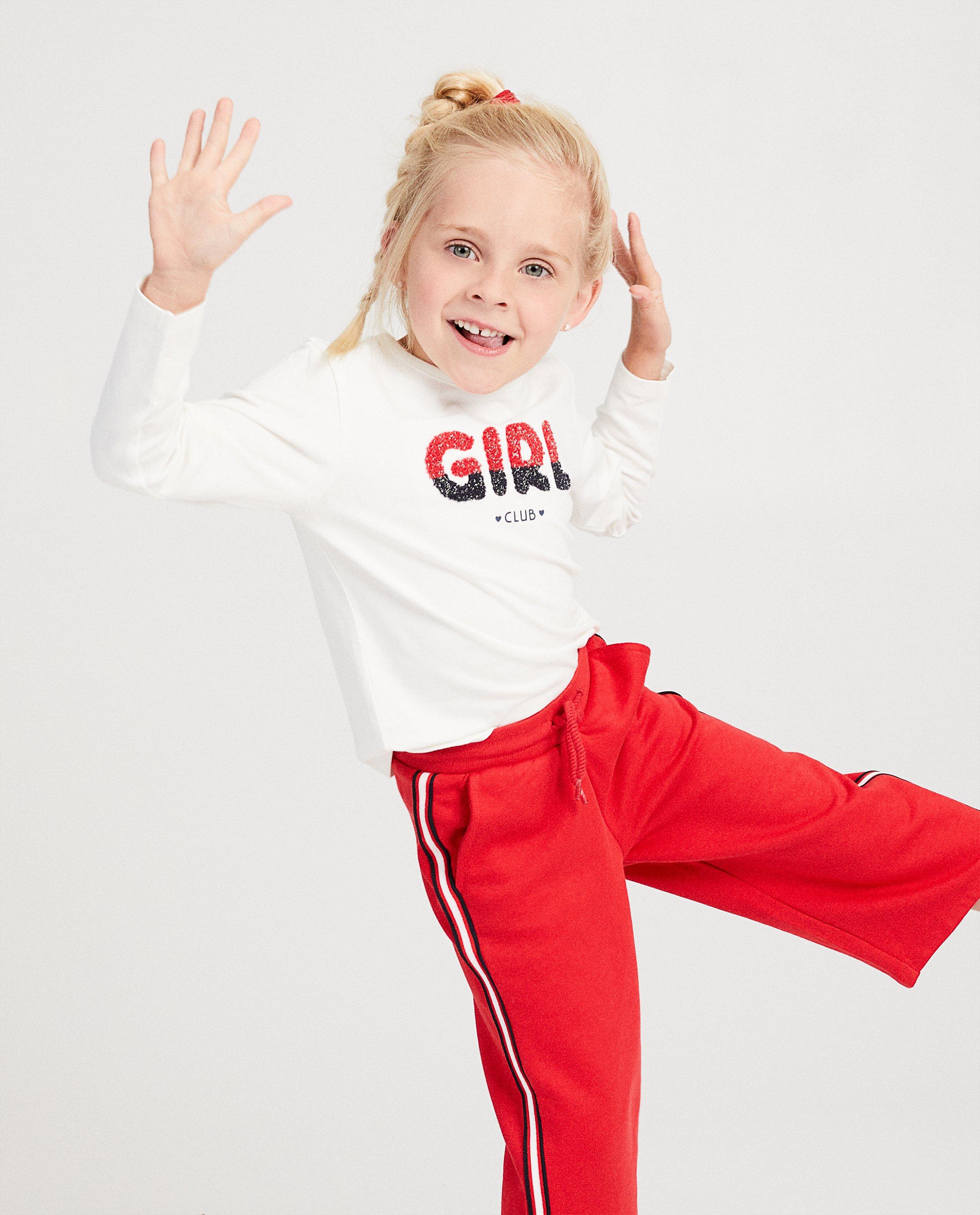Witte longsleeve met opschrift - in rood en blauw - Milla Star