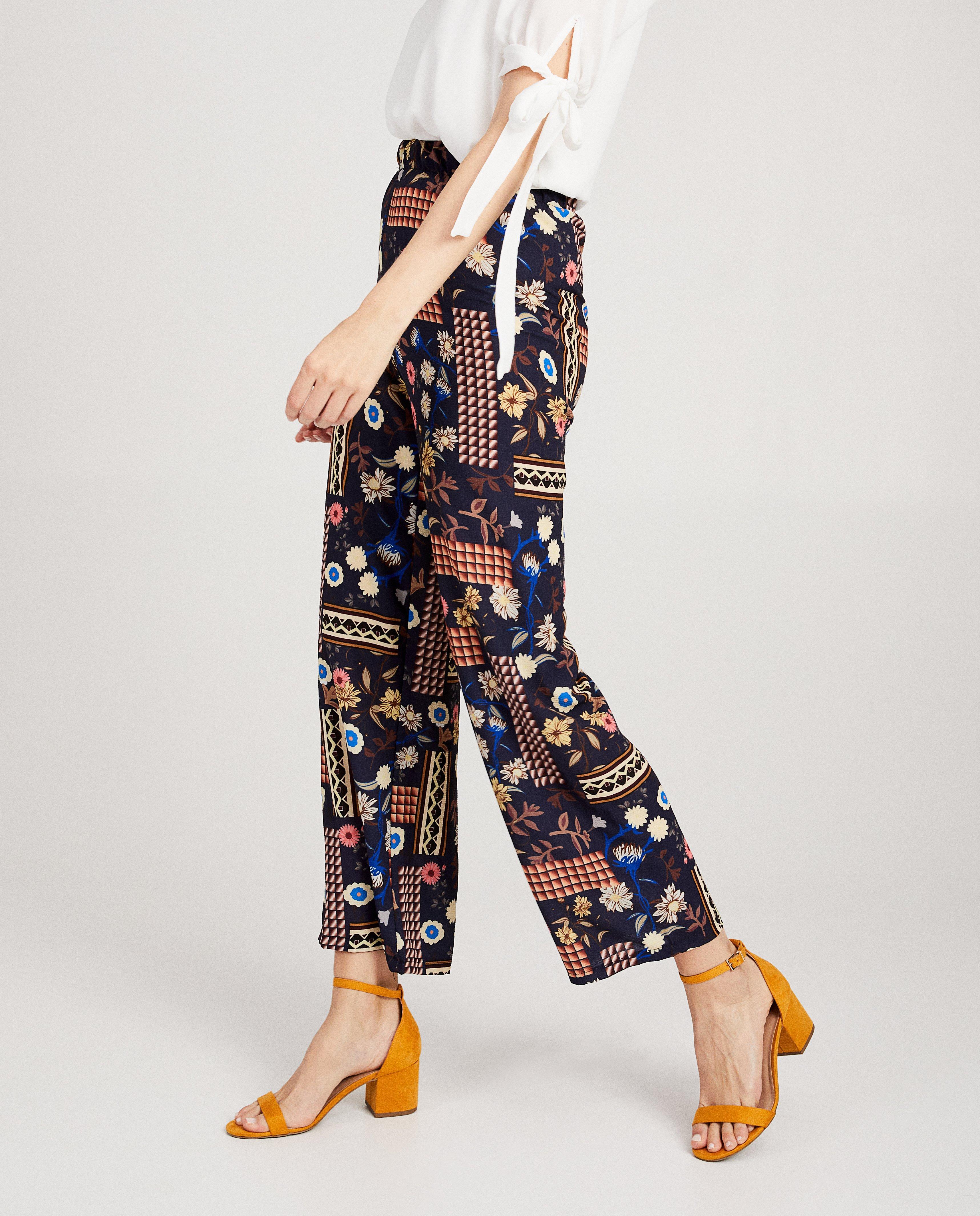 Broeken - Blauwe broek met bolde print