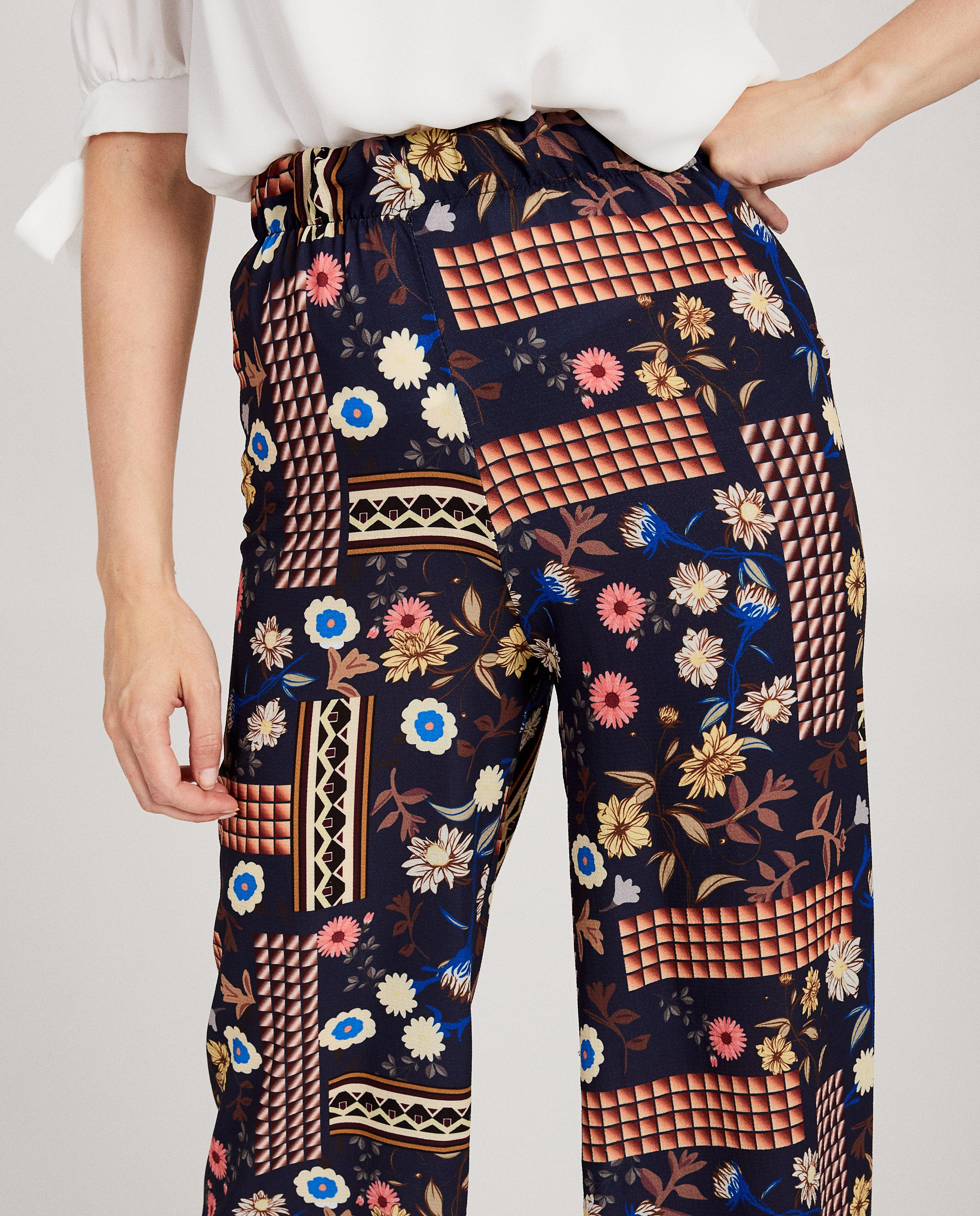 Broeken - Blauwe broek met bolde print