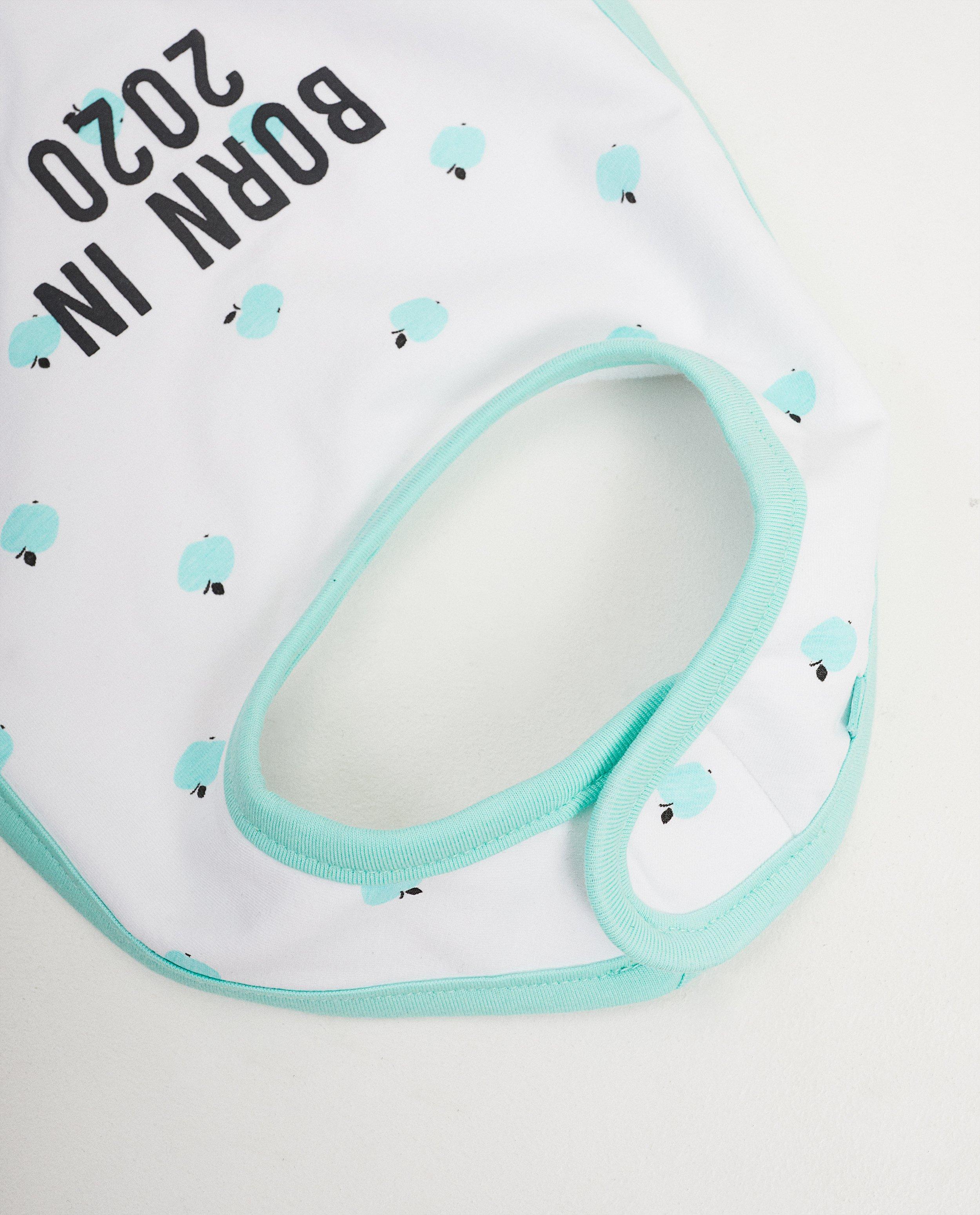 Accessoires pour bébés - Bavoir blanc avec une inscription