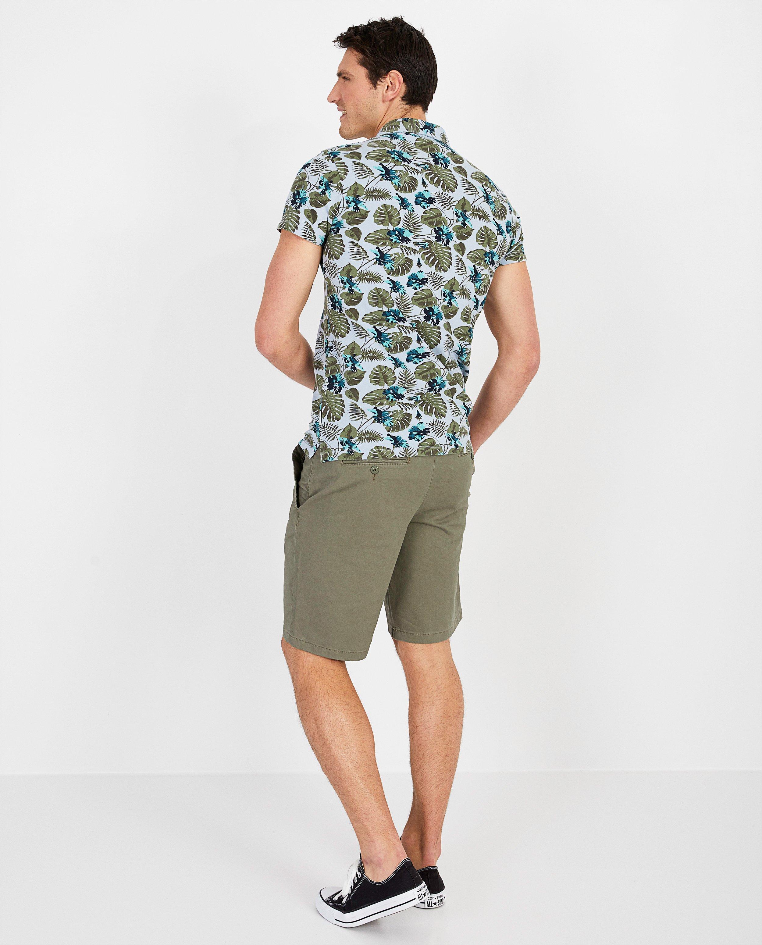 Polo's - Lichtblauwe polo met print Noize