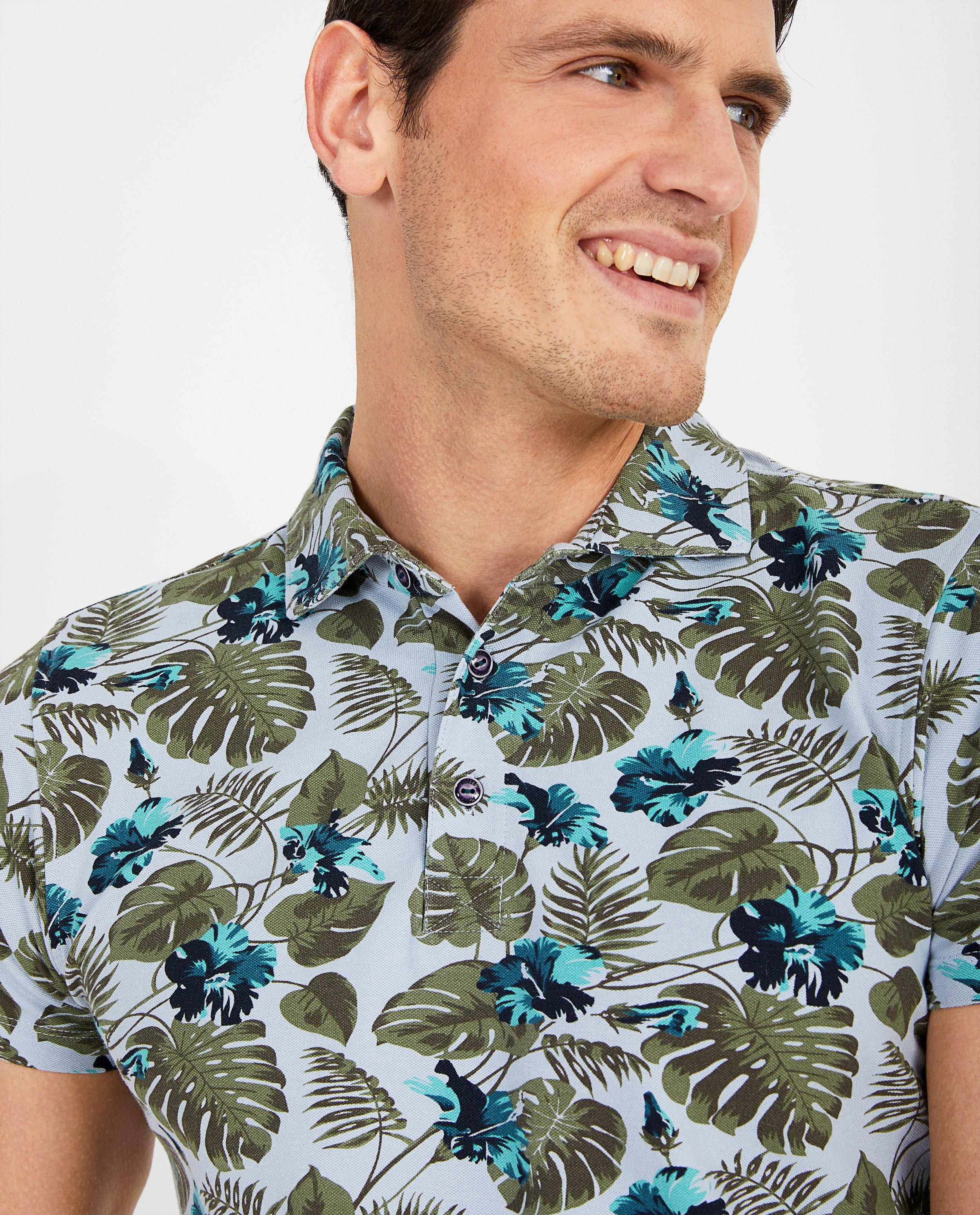 Polo's - Lichtblauwe polo met print Noize