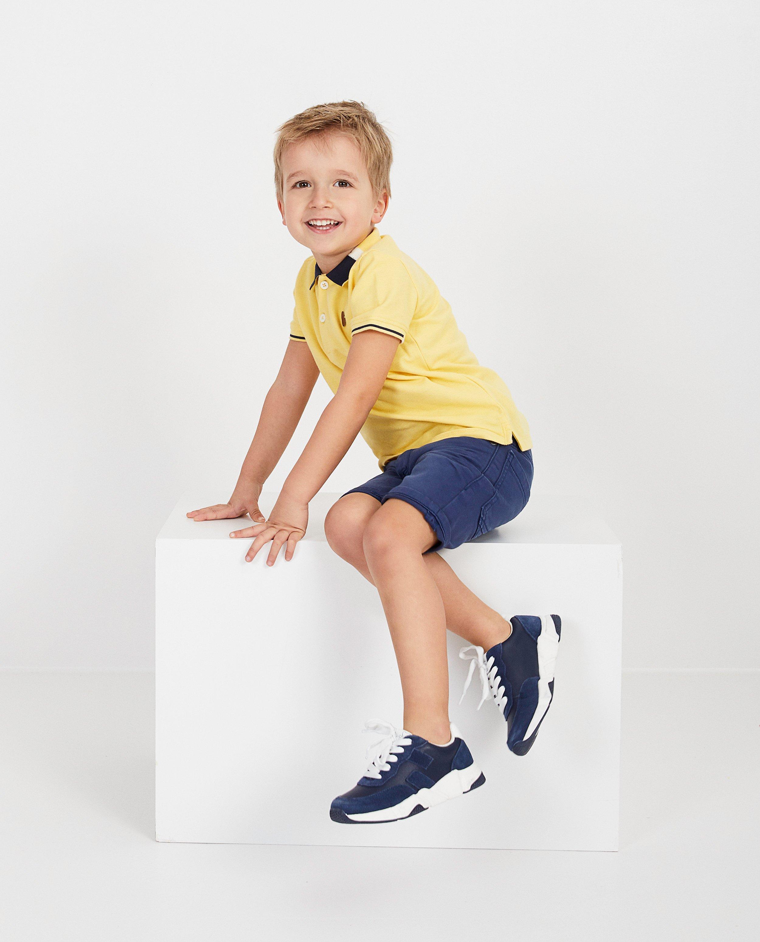 Gele polo Piet Piraat - met blauw en wit - Piet Piraat