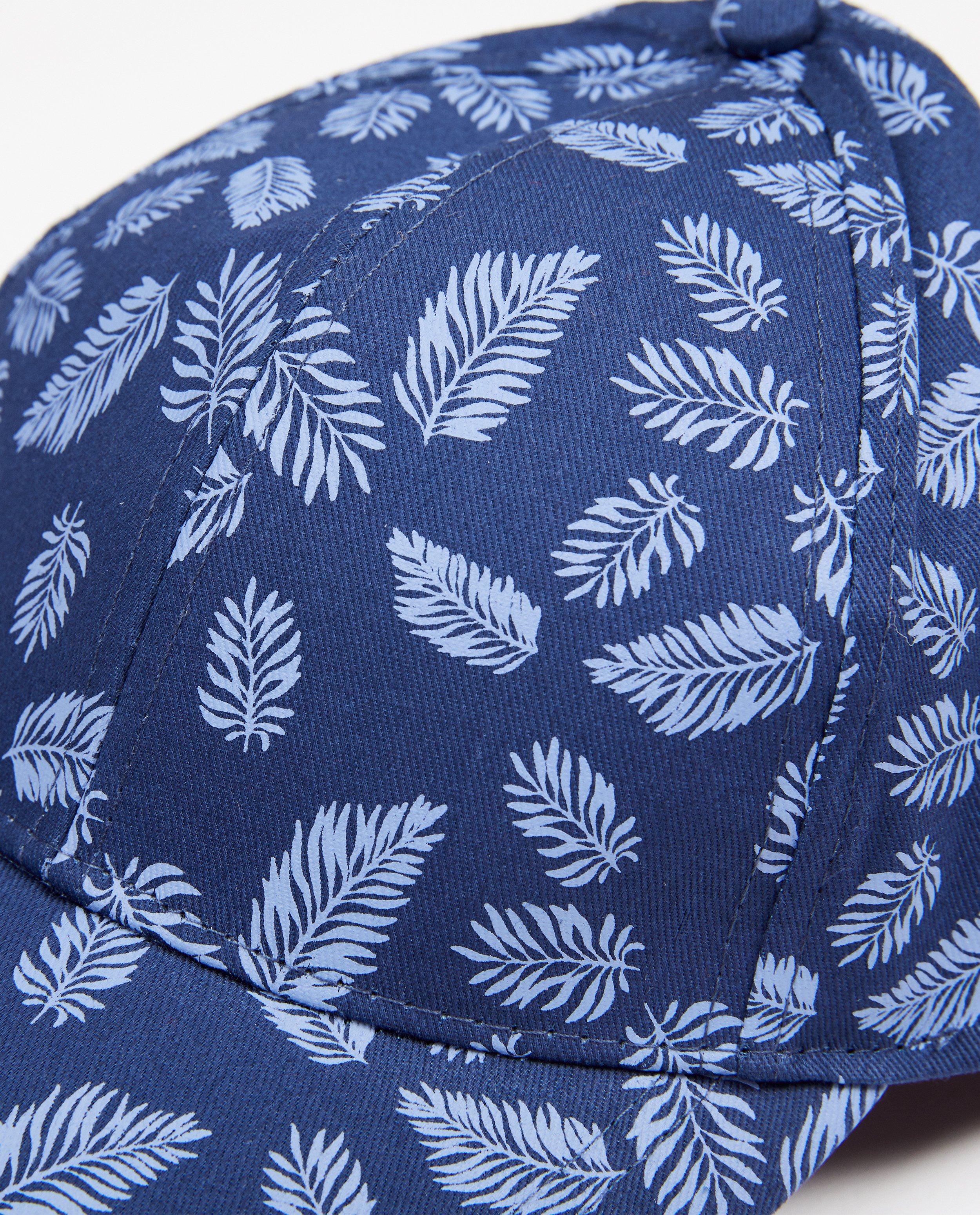 Bonneterie - Casquette bleue avec un imprimé