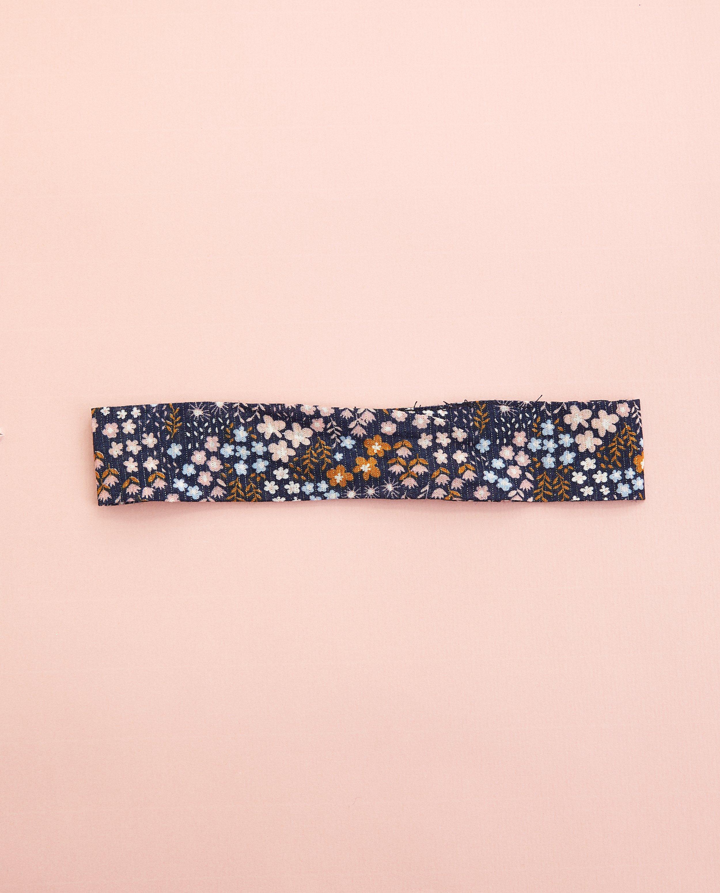 Bandeau bleu avec imprimé - et nœud - Cuddles and Smiles