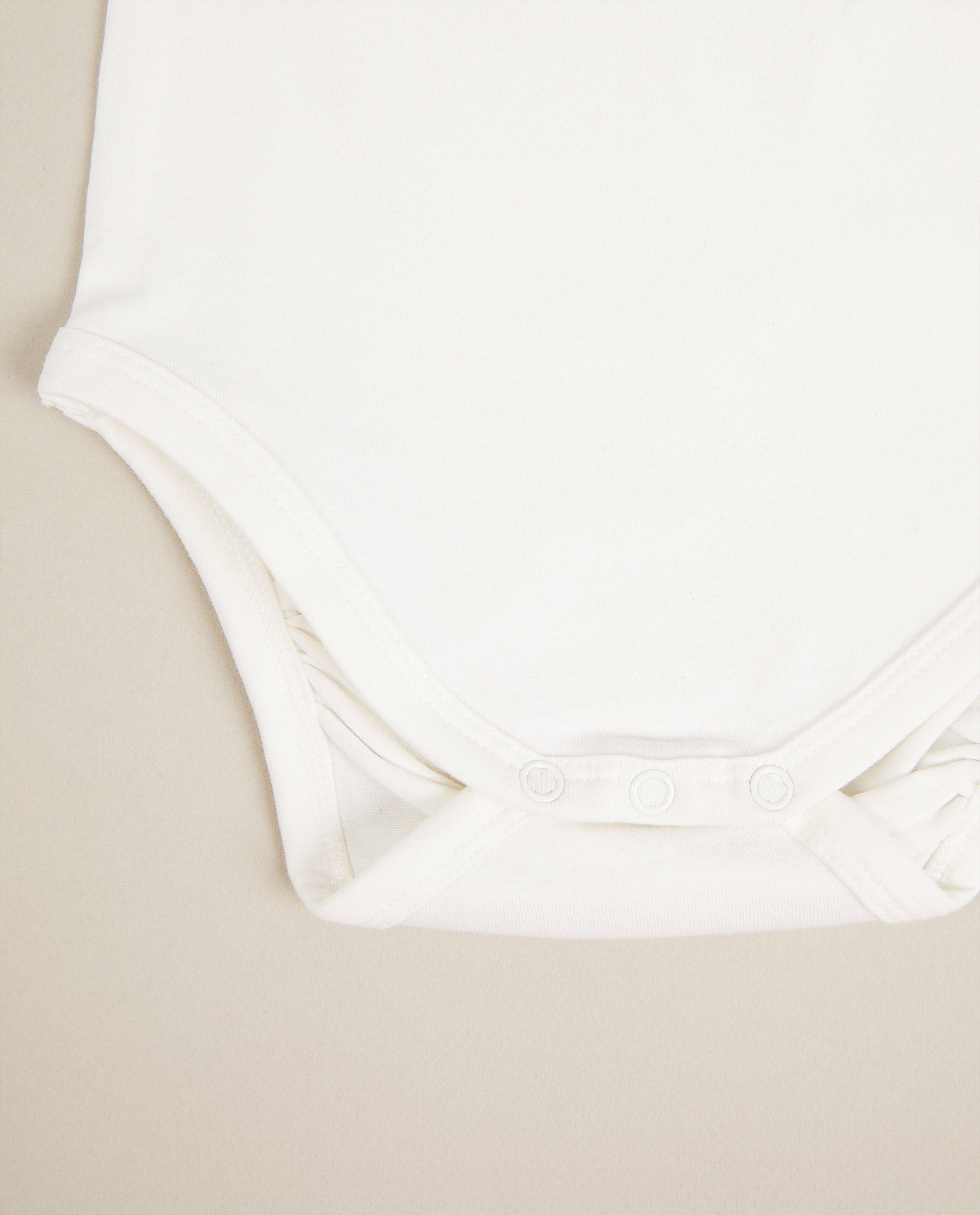 Onesies - Grenouillère avec nom Studio Unique