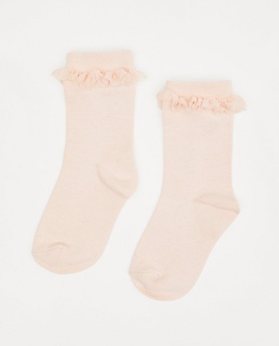 Roze kousen met ruches Roze kousen met ruches