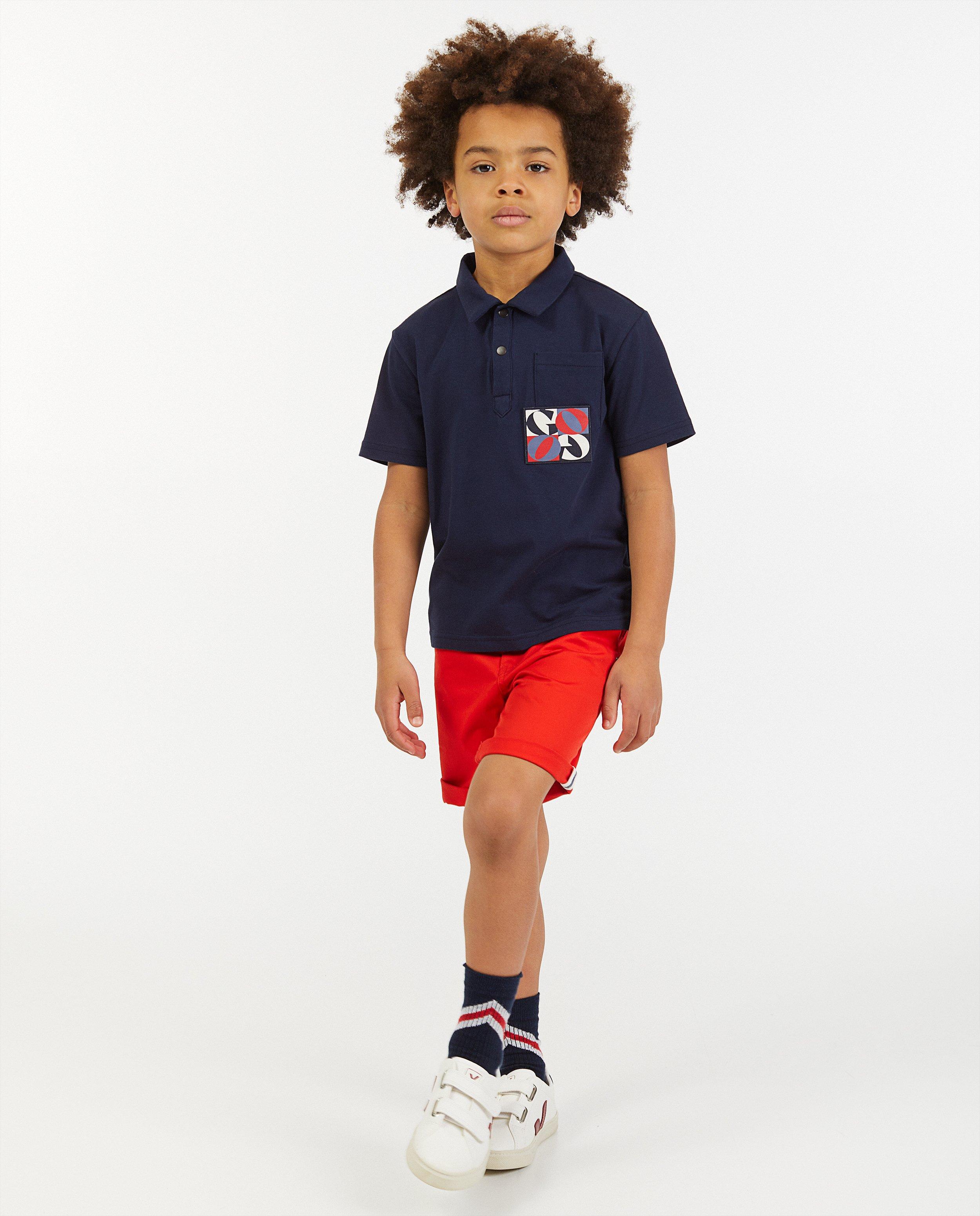 Donkerblauwe polo CKS - met patch - CKS