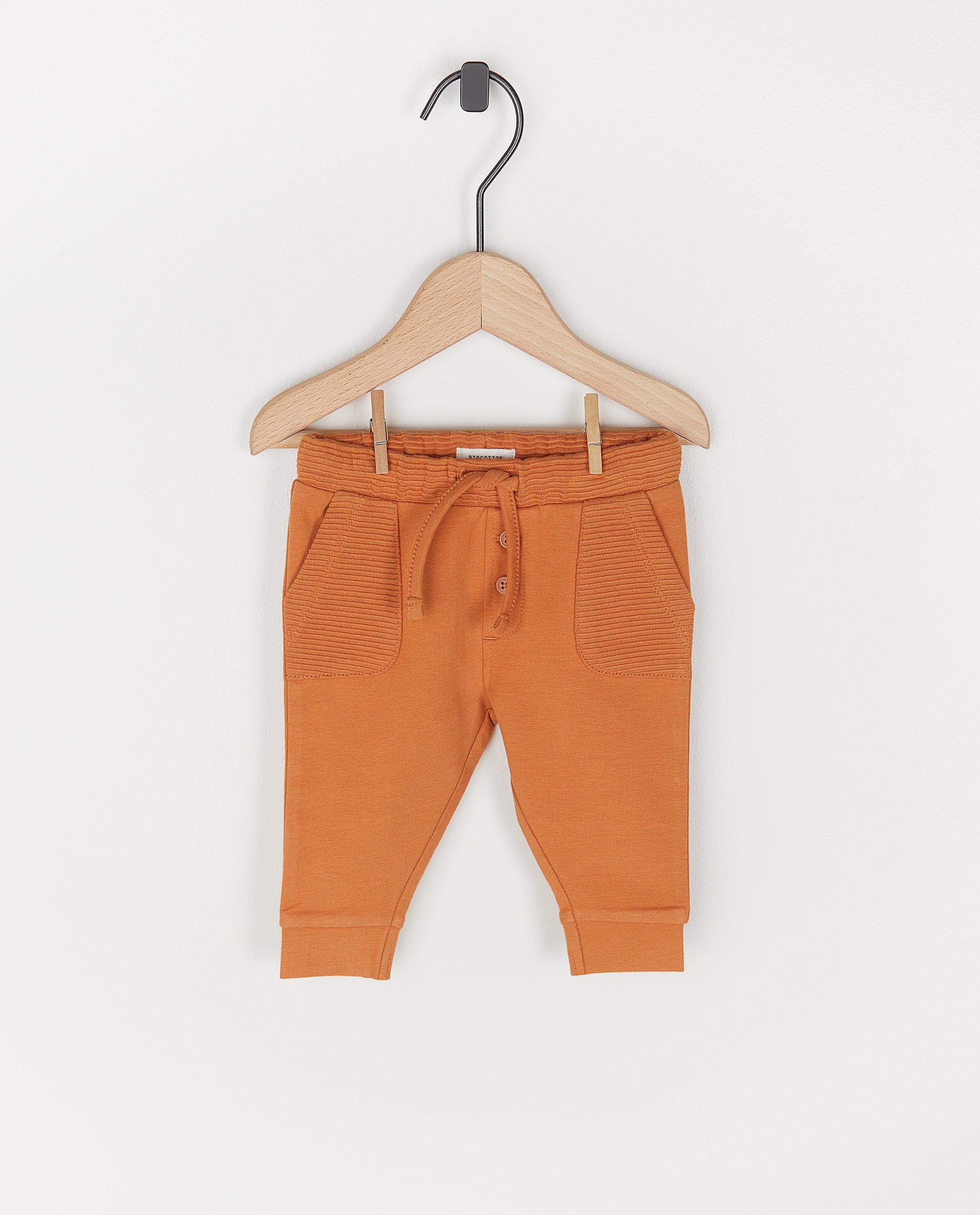 Biokatoenen unisex broekje - in oranje - Newborn 50-68