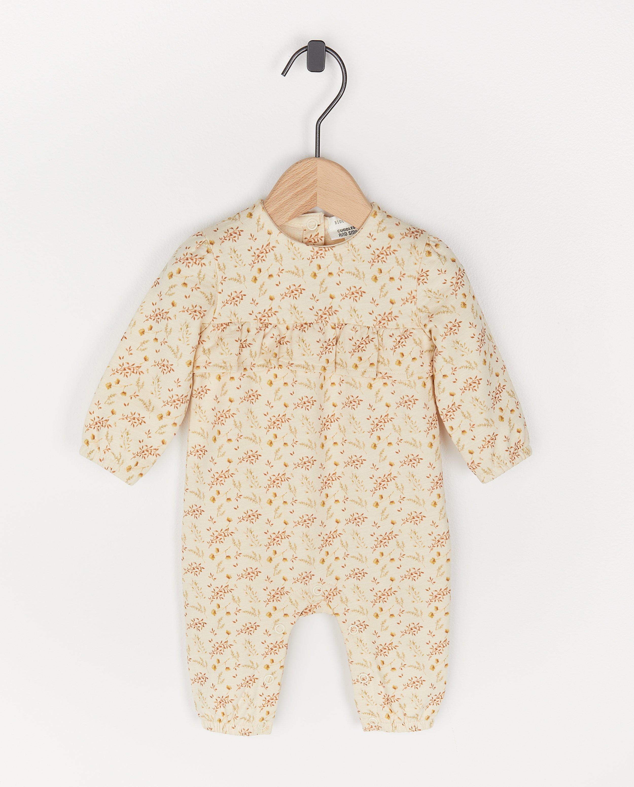 Biokatoenen jumpsuit met print - in crème - Newborn 50-68