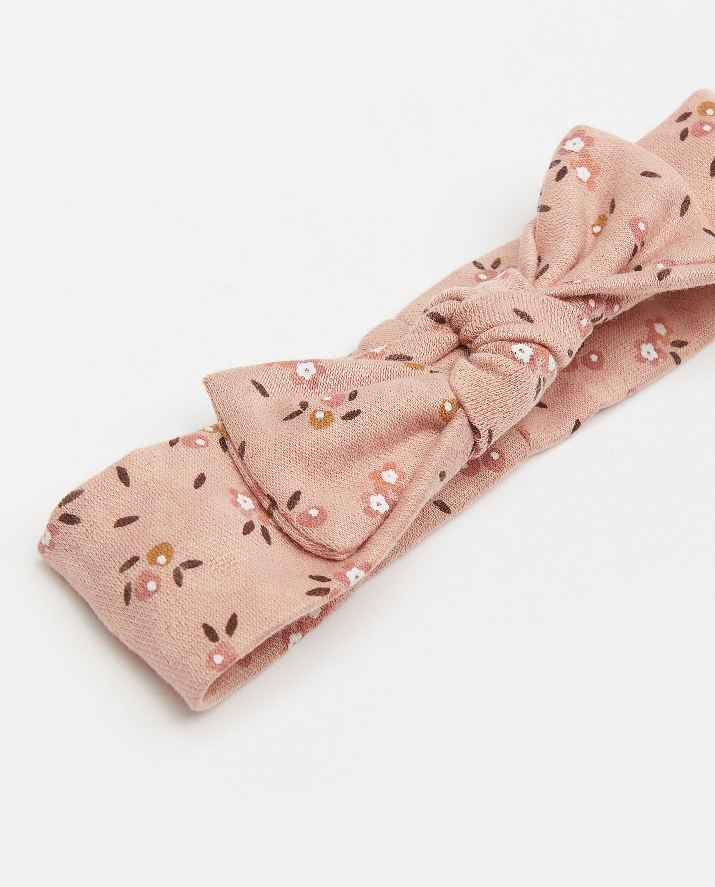 Breigoed - Roze haarband met bloemenprint