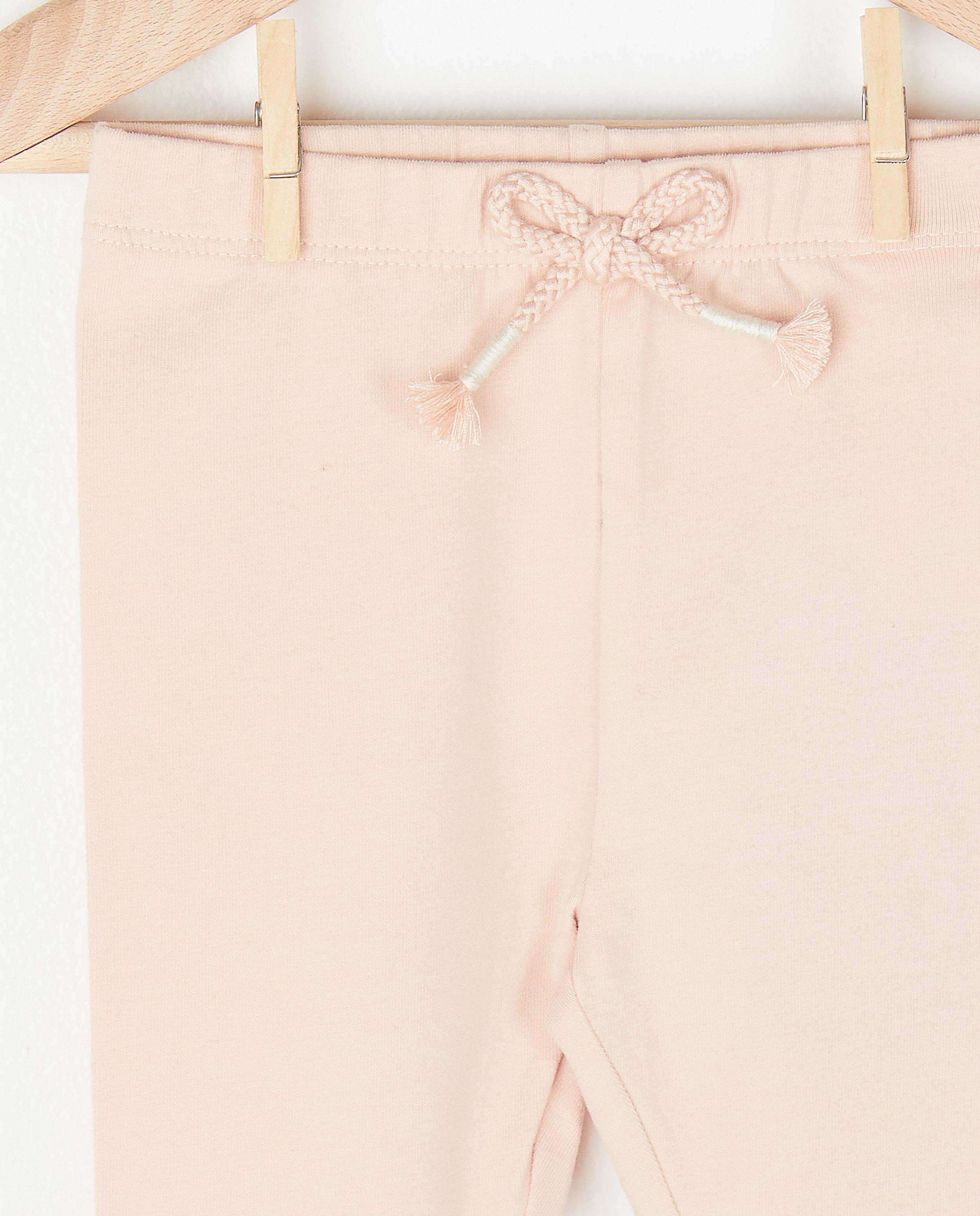 Broeken - Roze legging met strikje