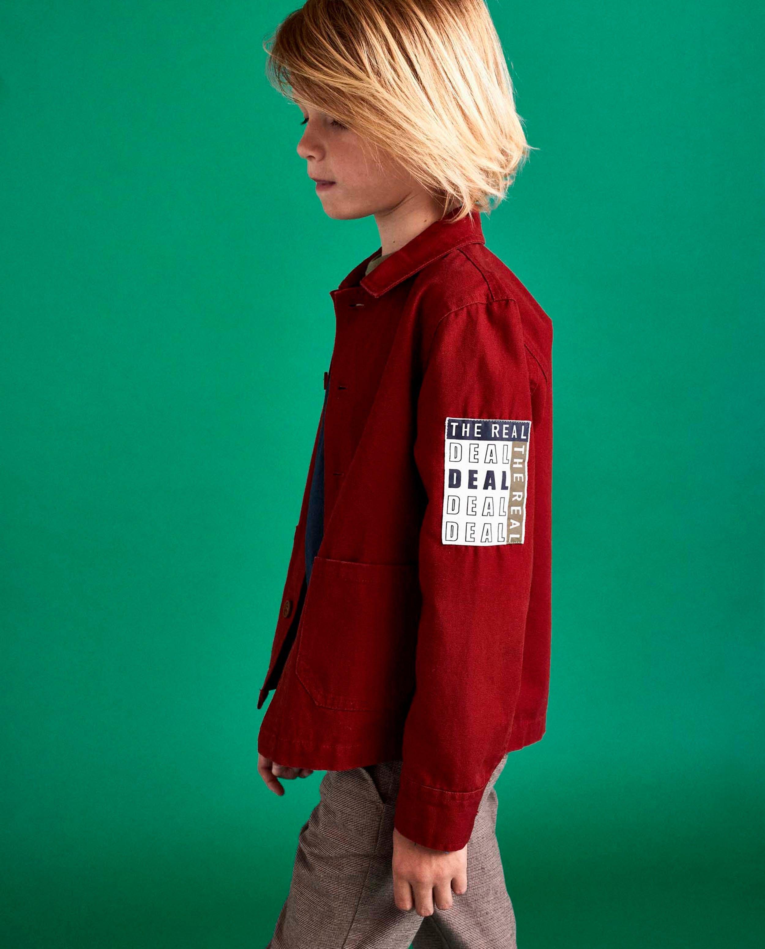 Rood vest met patch CKS - op de mouw - CKS