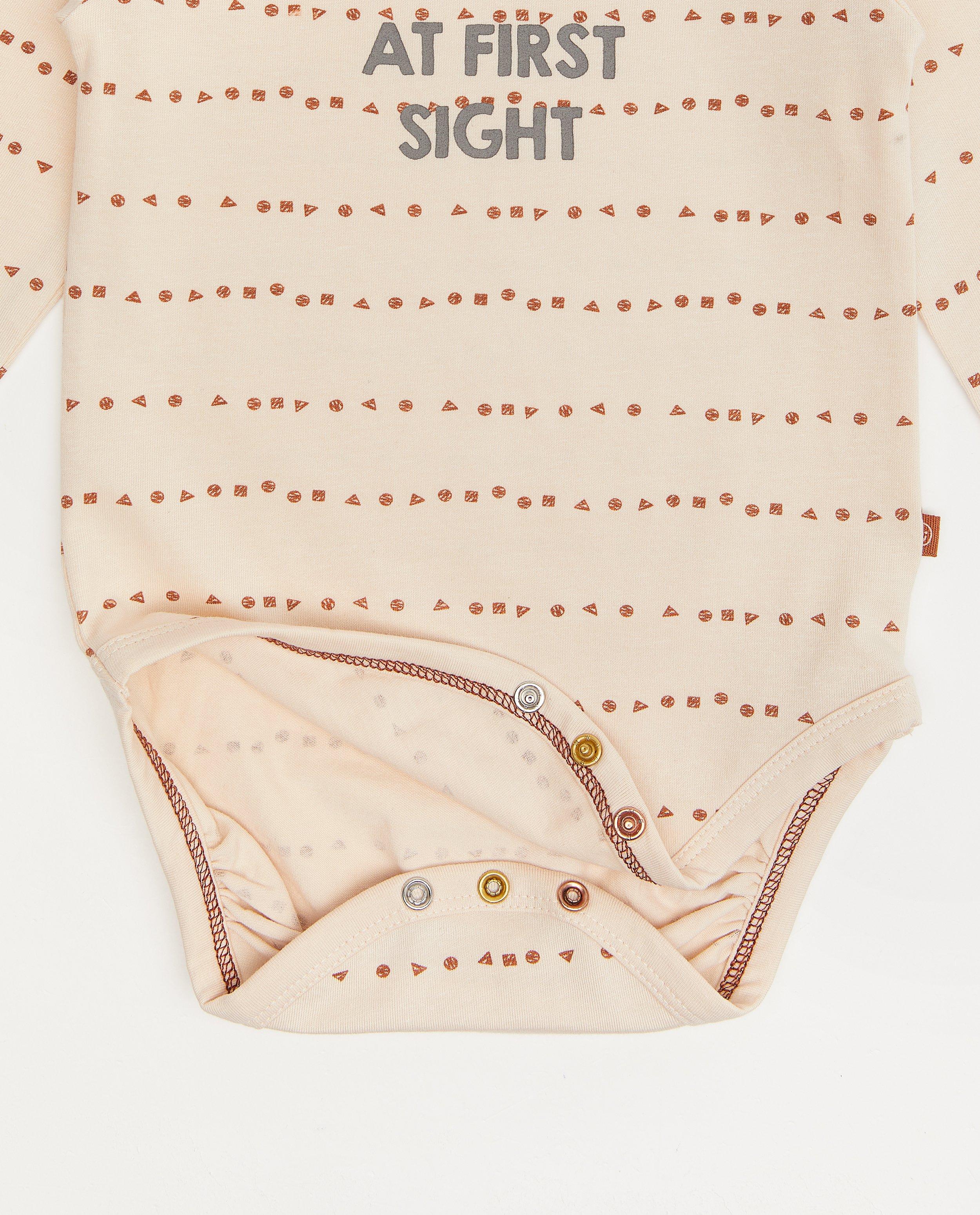 Onesies - Witte romper met opschrift