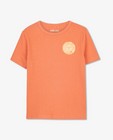 T-shirts - T-shirt orange avec un écusson