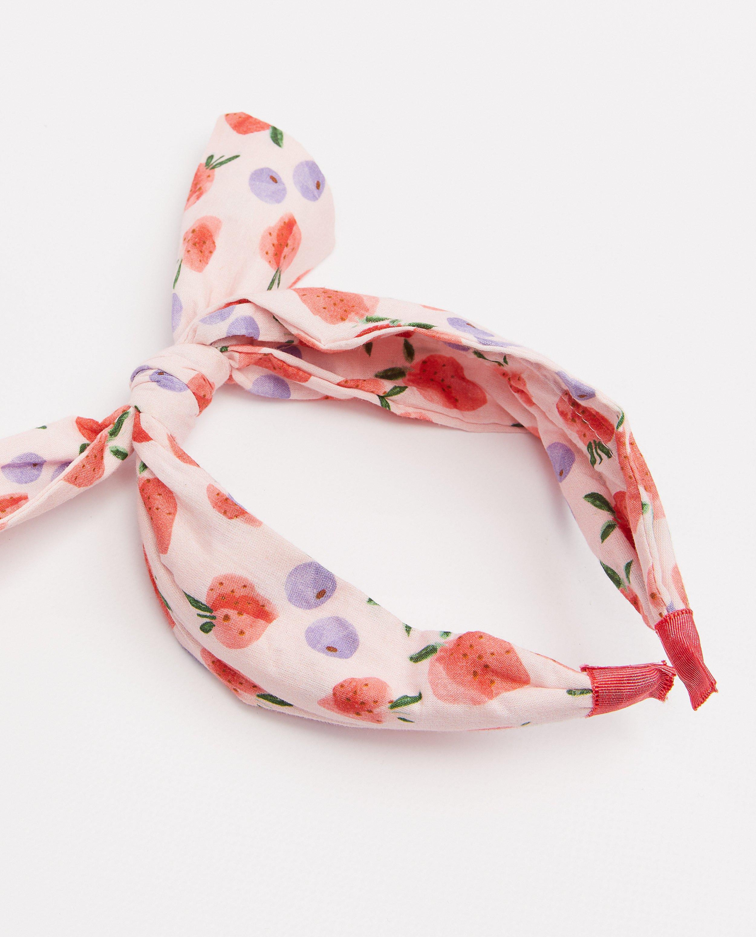 Breigoed - Roze haarband met print