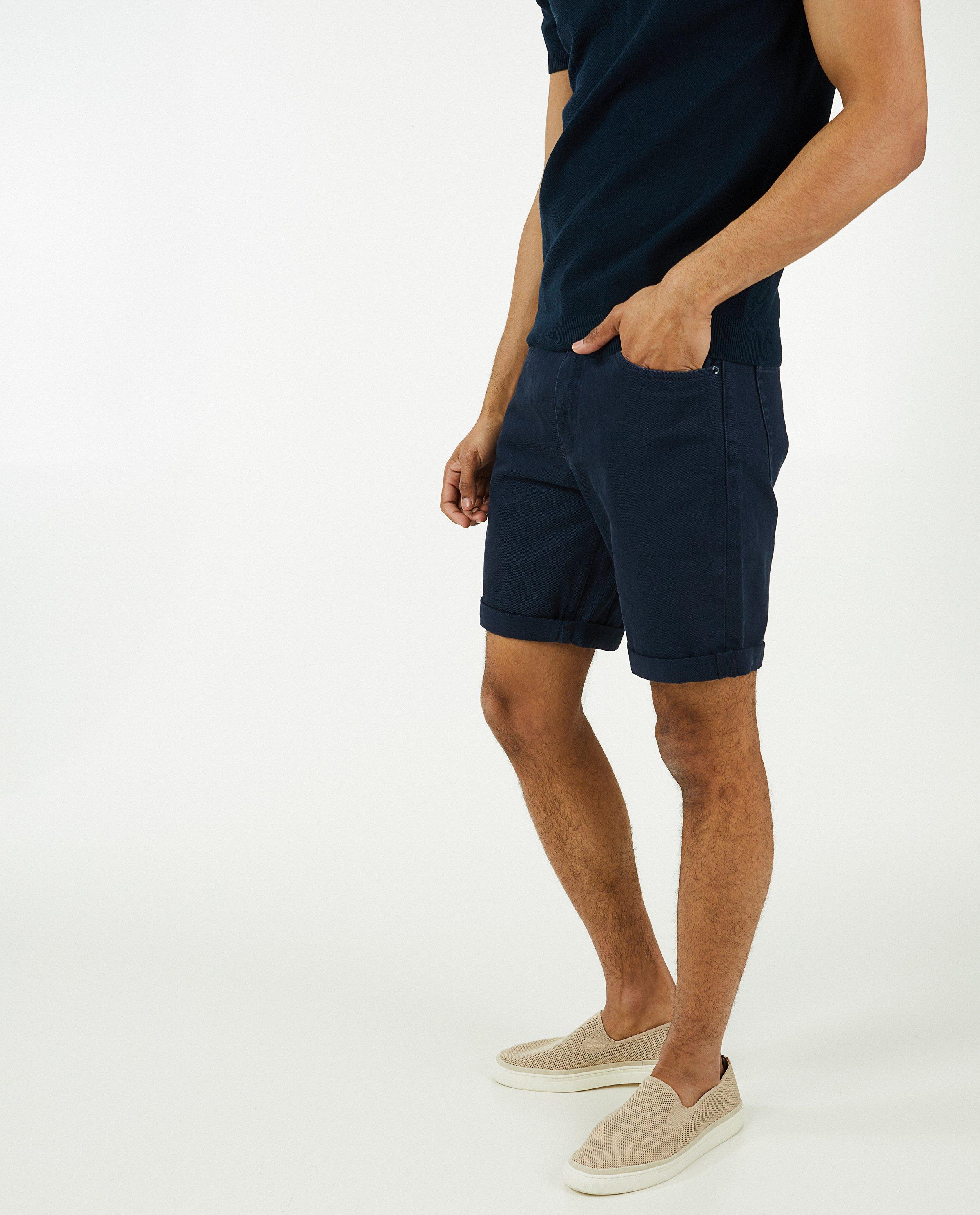 Shorten - Donkerblauwe short met knoopsluiting