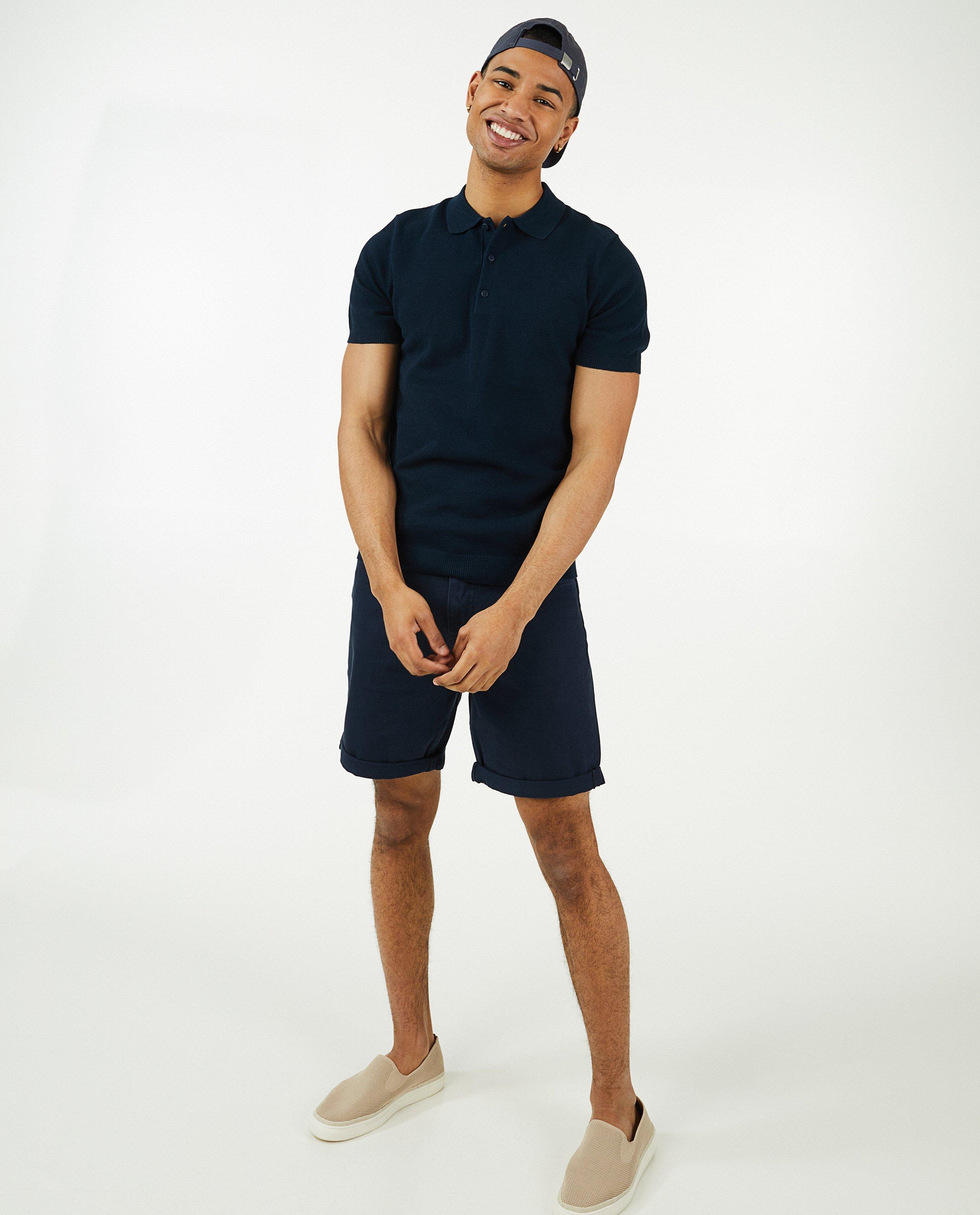 Shorten - Donkerblauwe short met knoopsluiting