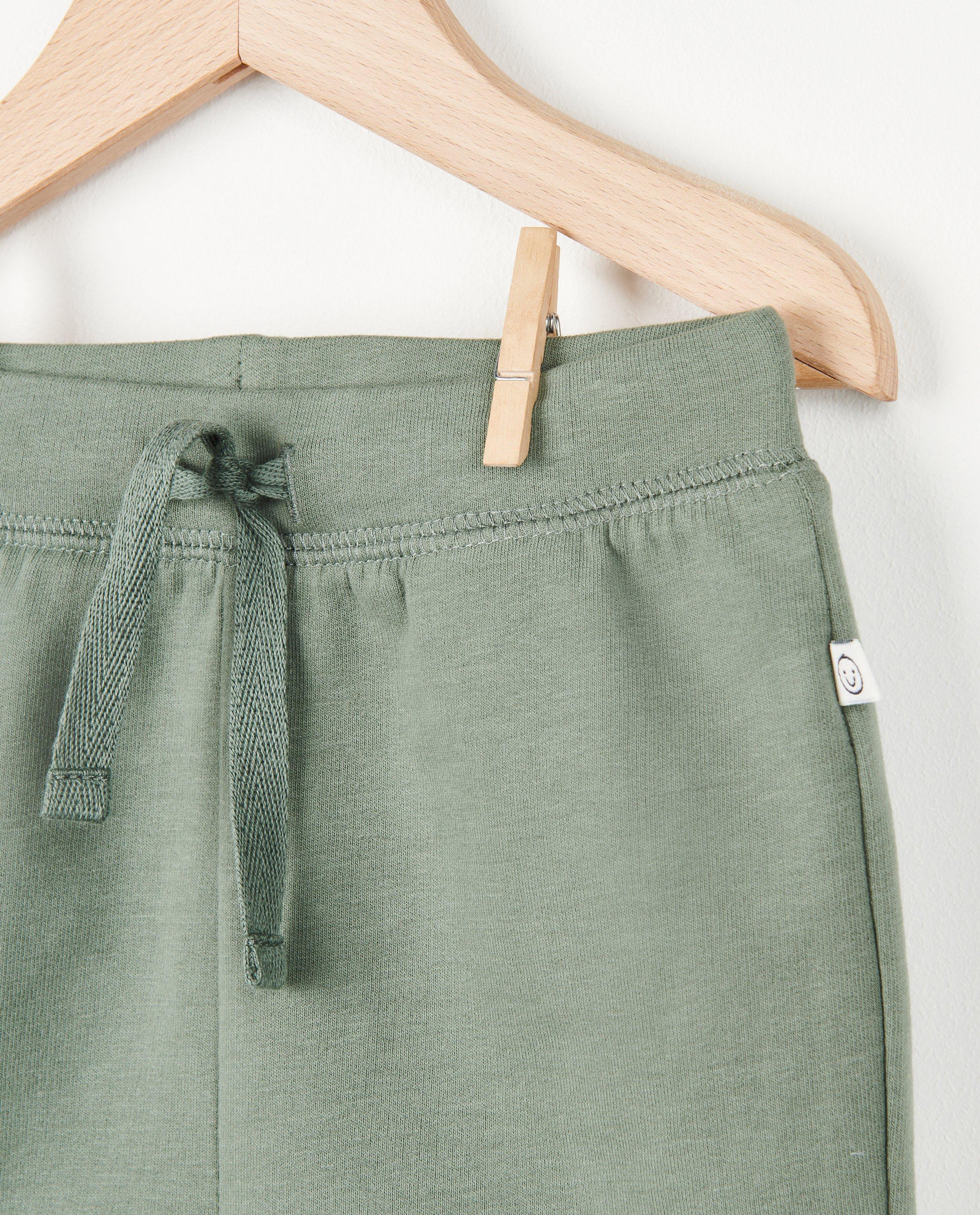 Shorts - Short vert avec cordon de serrage sous tunnel