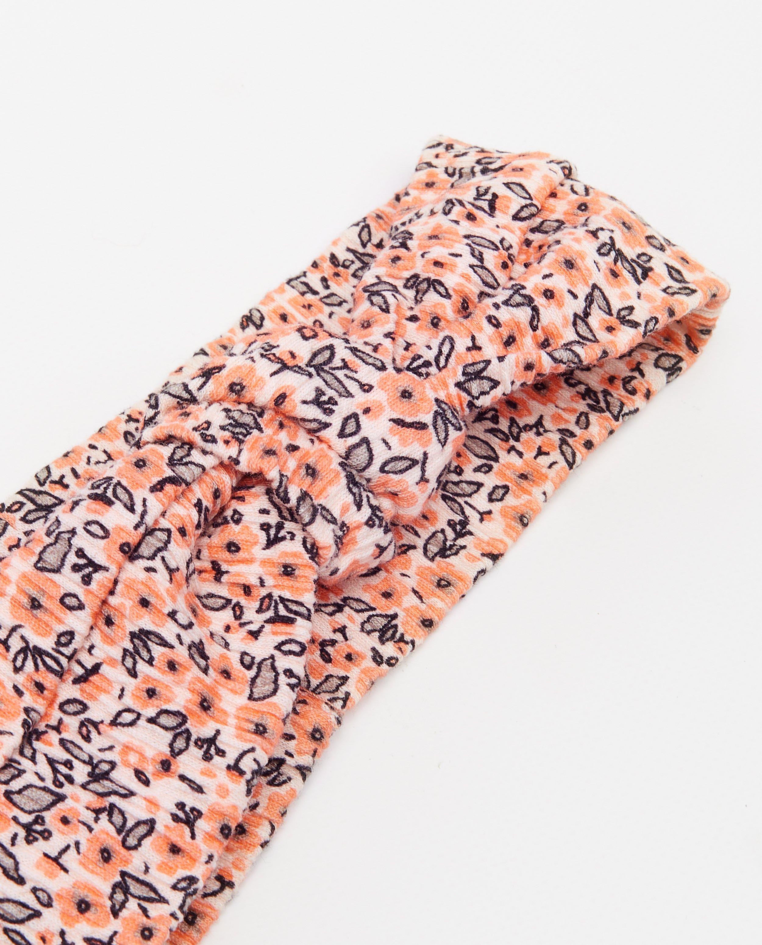 Breigoed - Witte haarband met bloemenprint