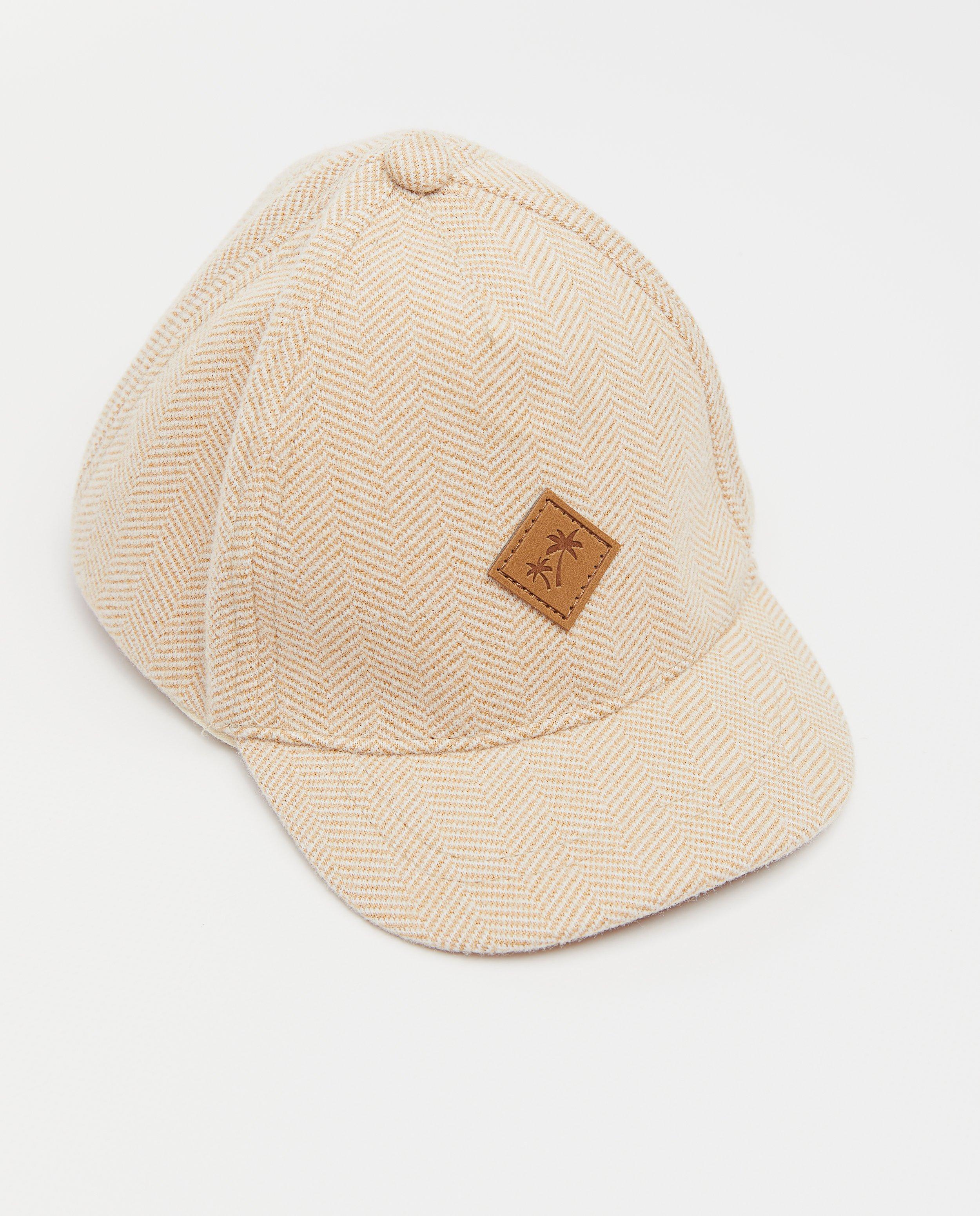 Breigoed - Beige pet met patch