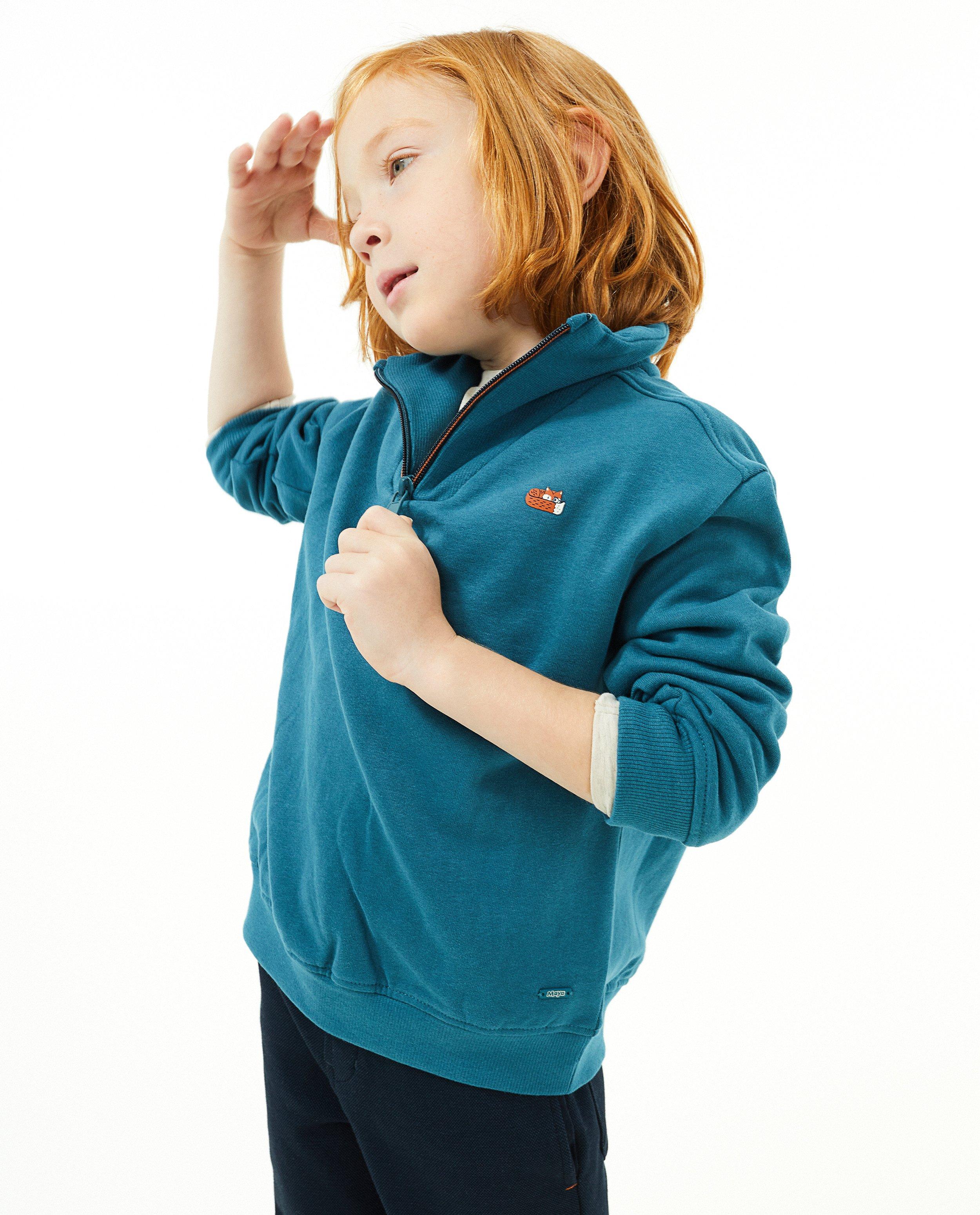 Sweats - Sweat bleu avec une courte fermeture à glissière