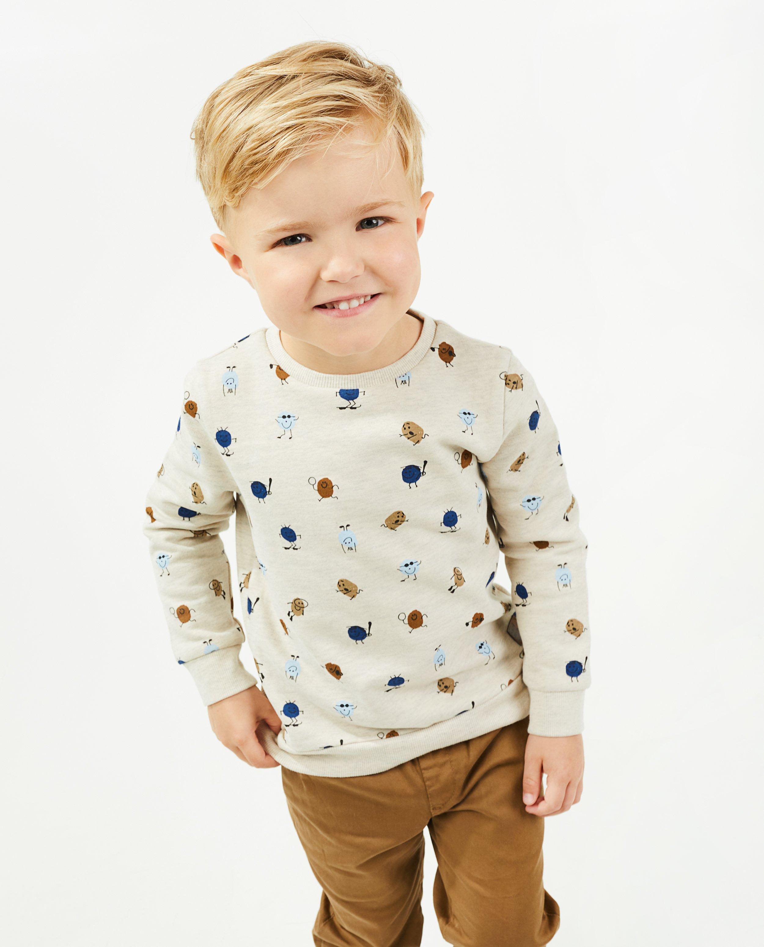 Sweaters - Beige sweater met print
