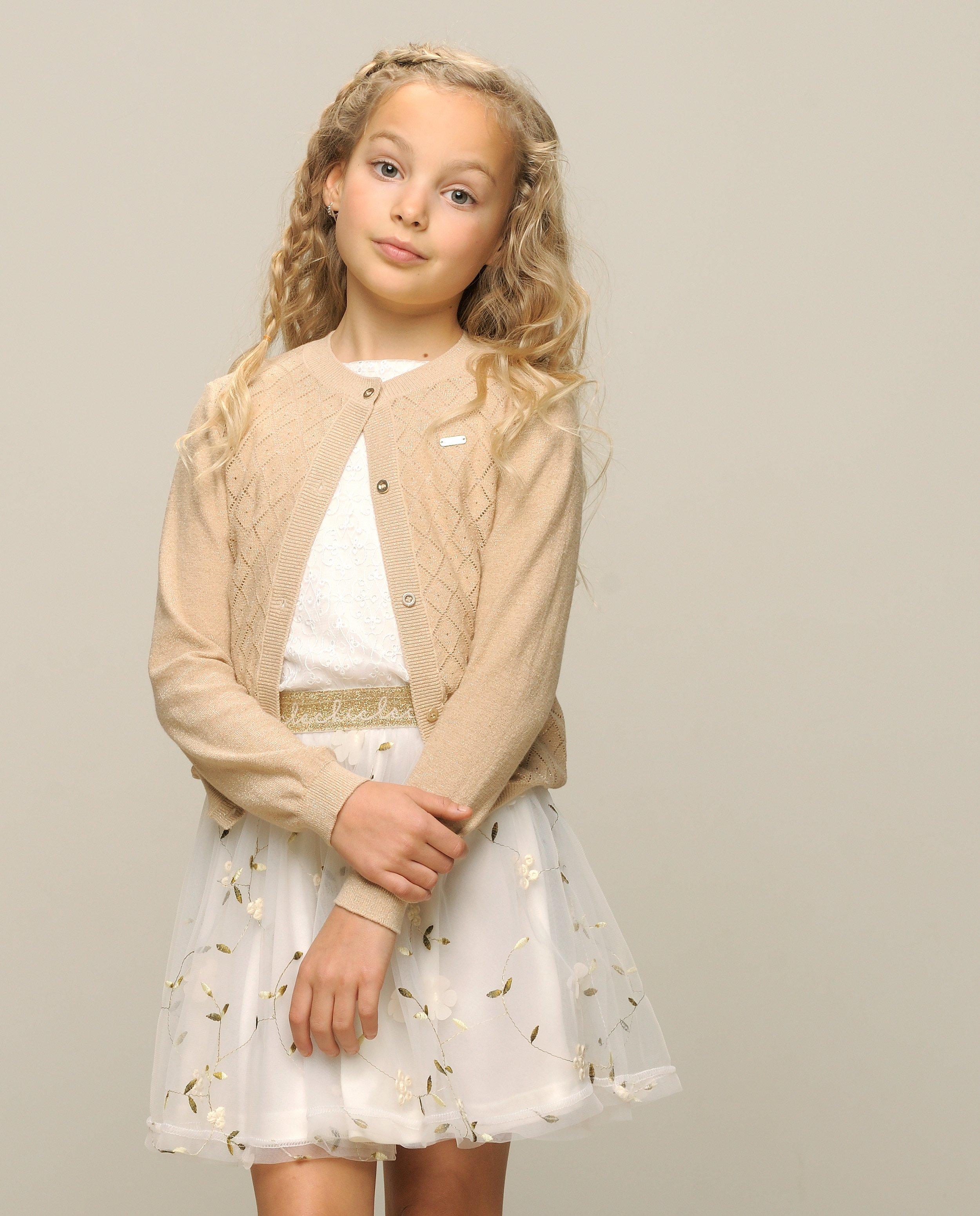 Cardigan - Gouden cardigan, Communie