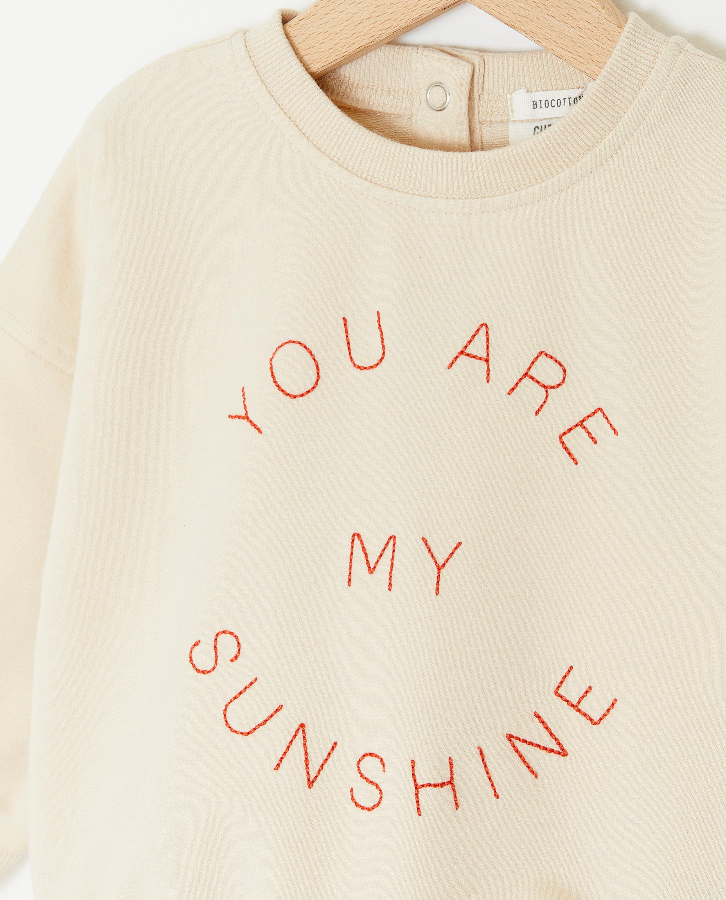 Sweaters - Beige sweater met opschrift