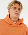 Sweaters - Oranje sweater met opschrift