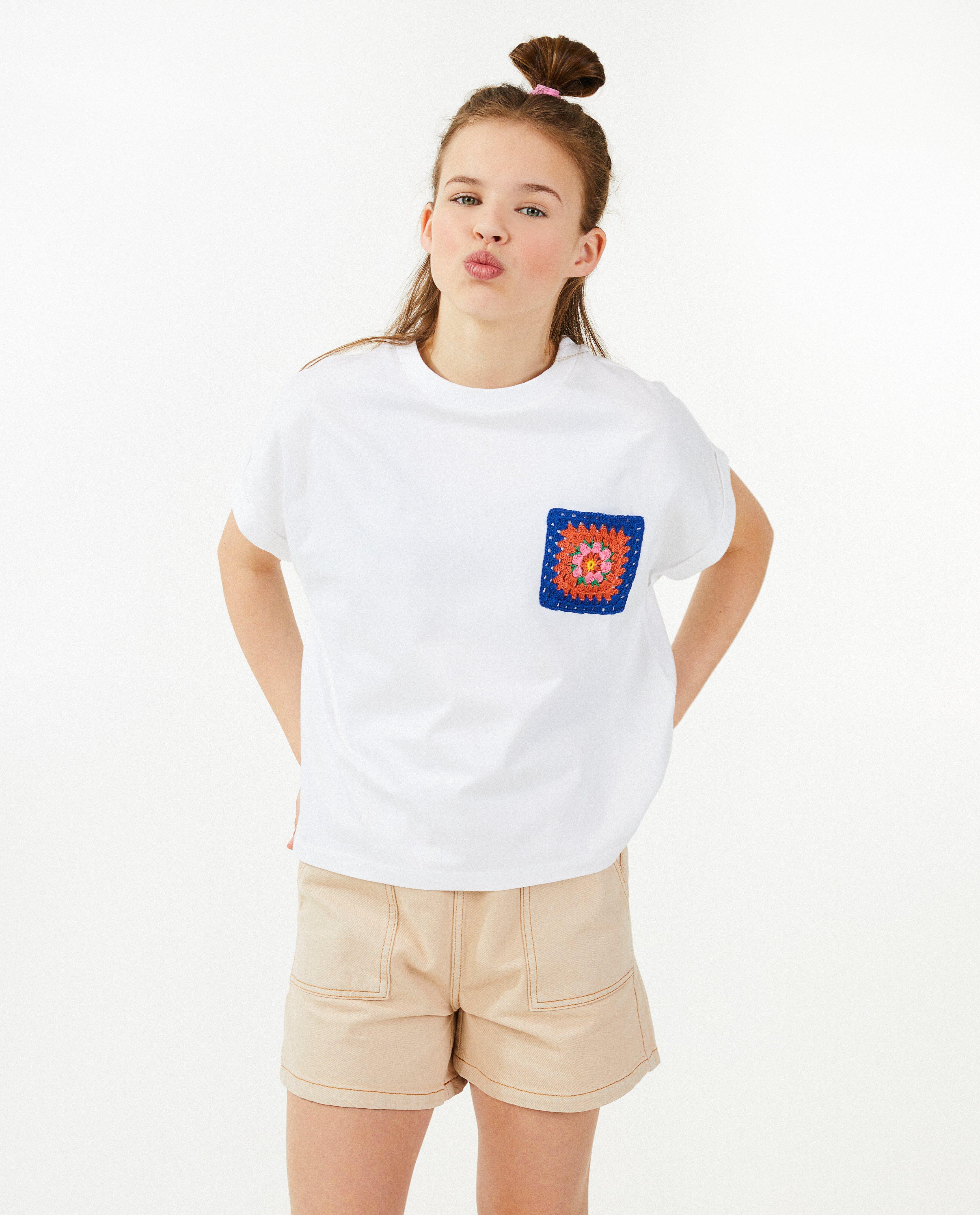 T-shirts - T-shirt blanc avec une poche de poitrine