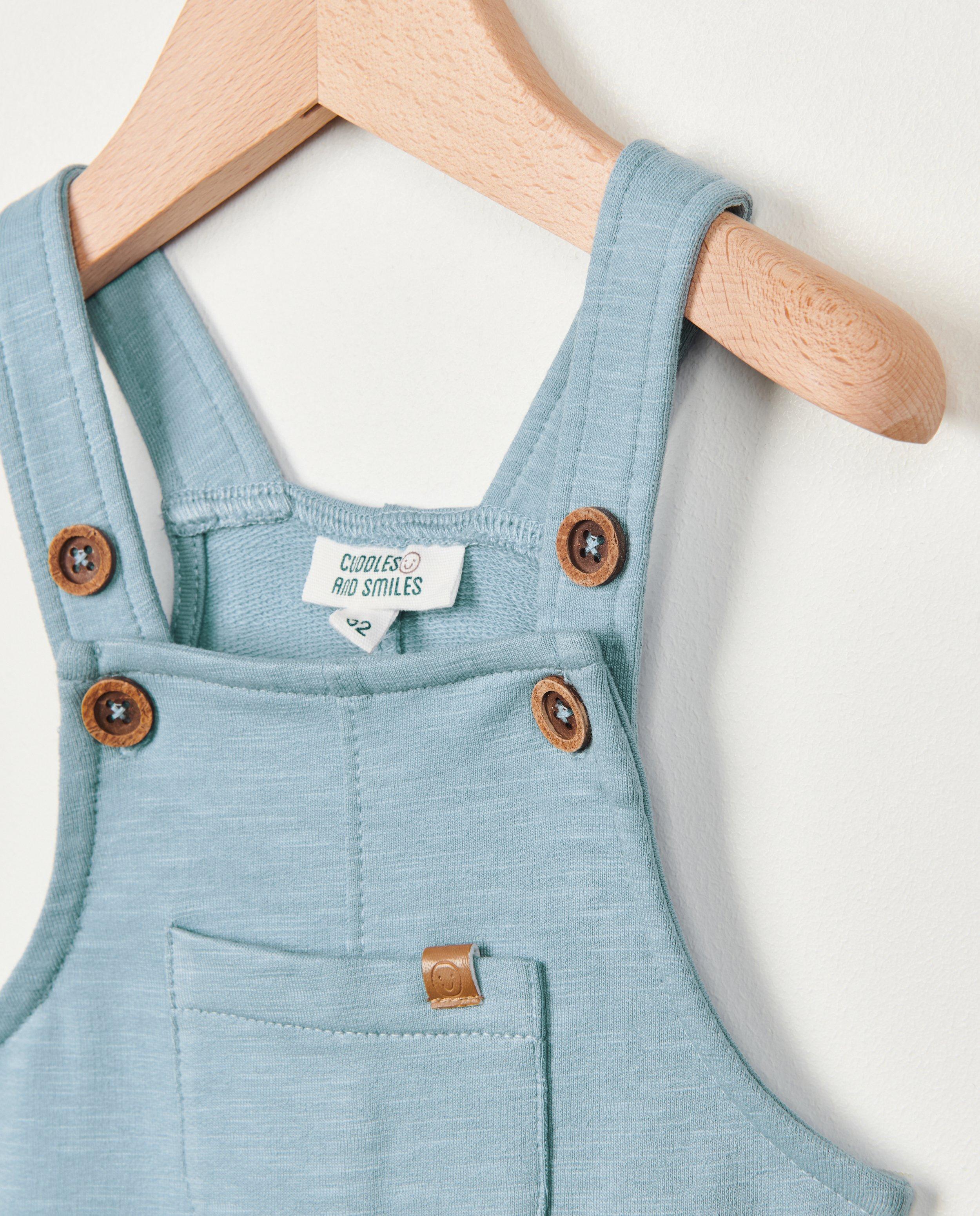 Broeken - Blauwe jumpsuit van sweatstof