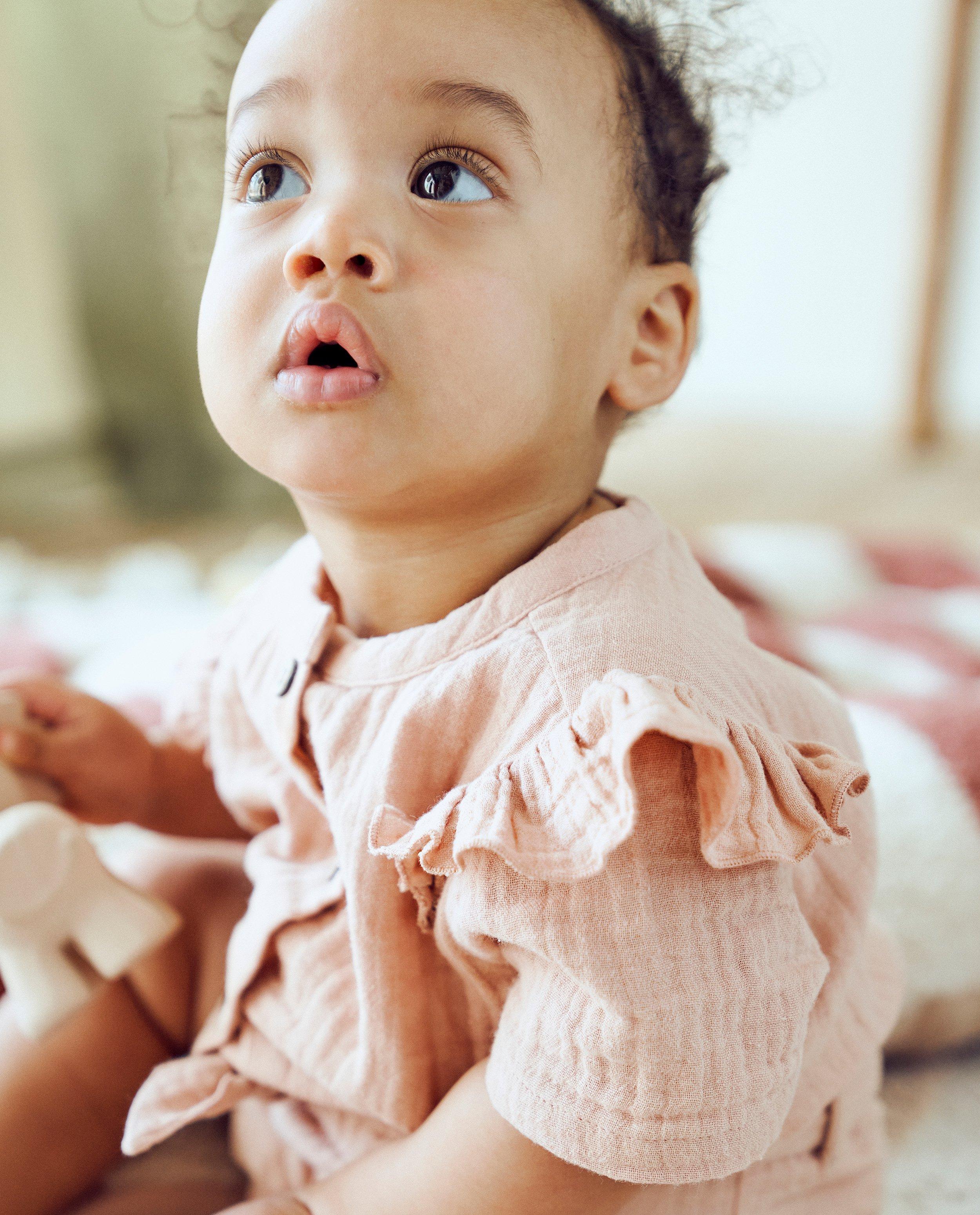 Roze jumpsuit van tetra - null - Cuddles and Smiles
