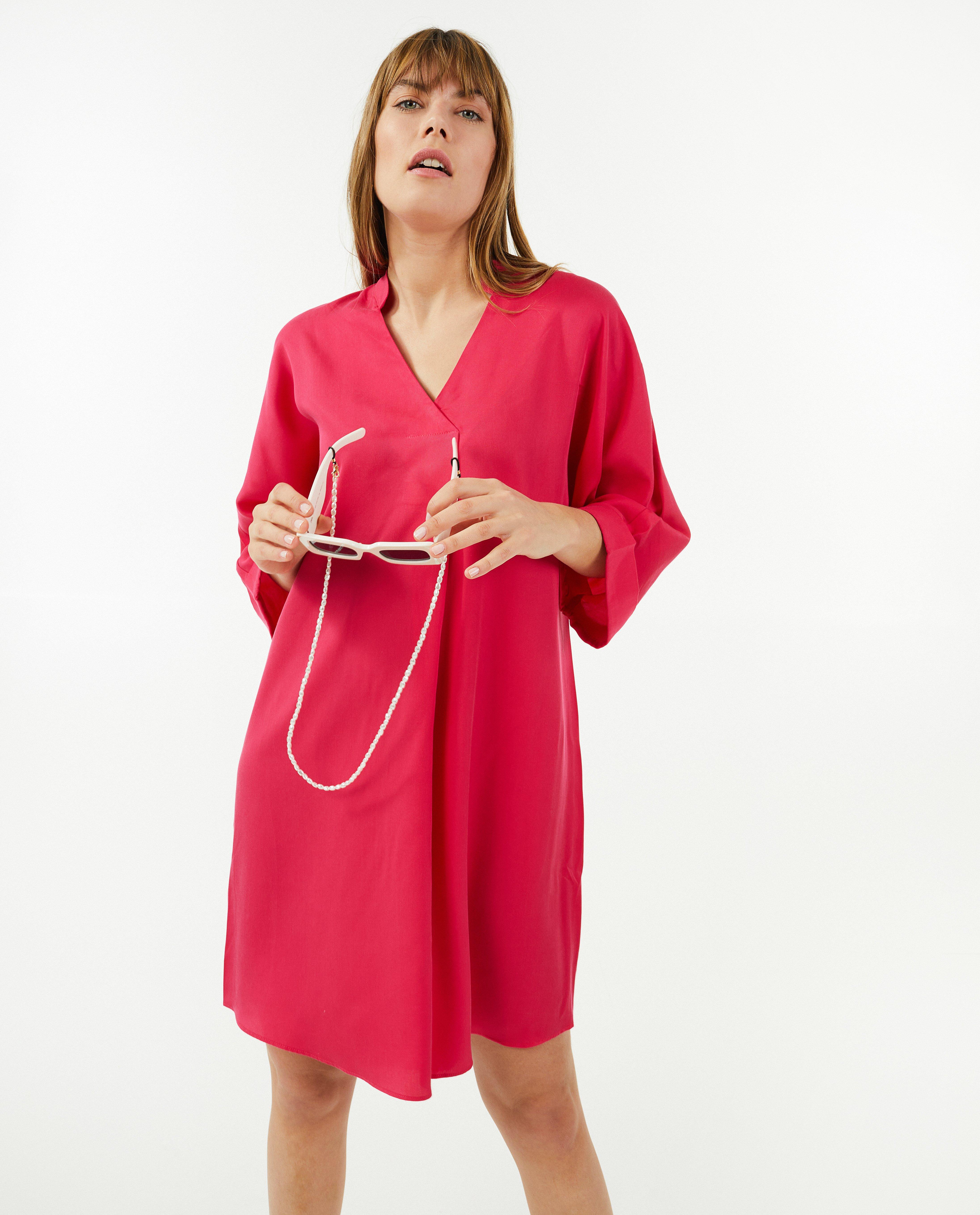 Robes - Robe rose avec un pli