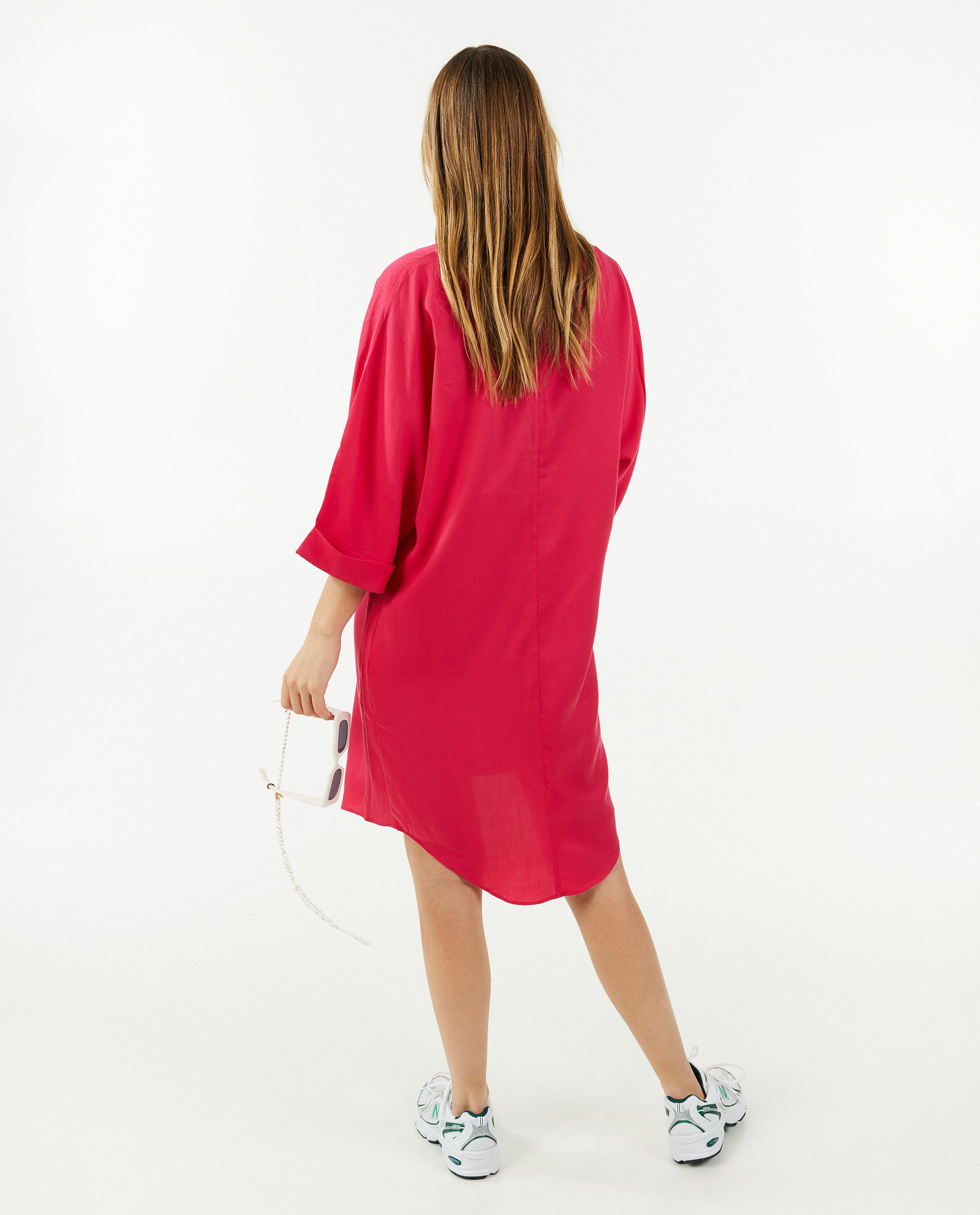 Robes - Robe rose avec un pli