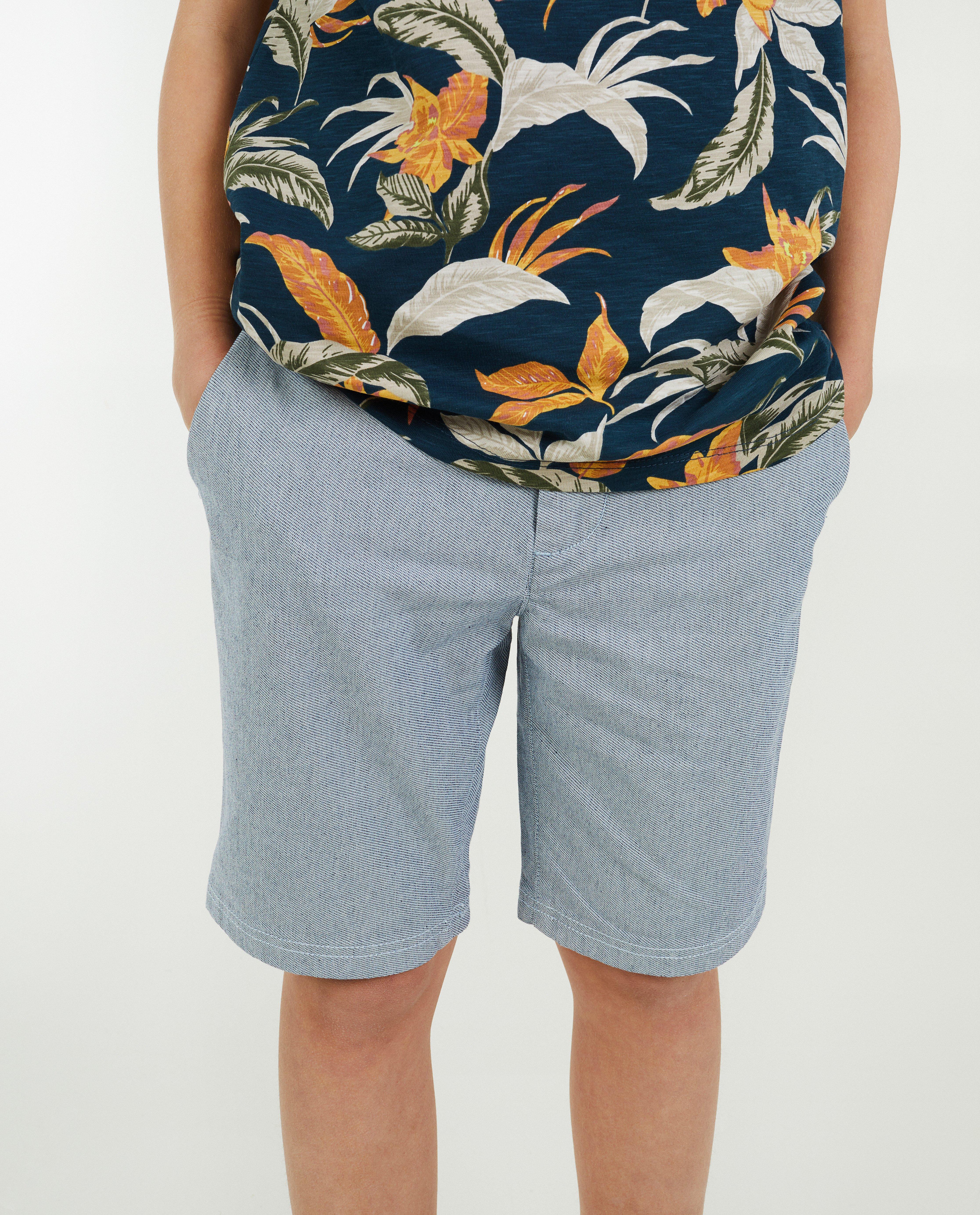 Shorten - Lichtblauwe short met structuur
