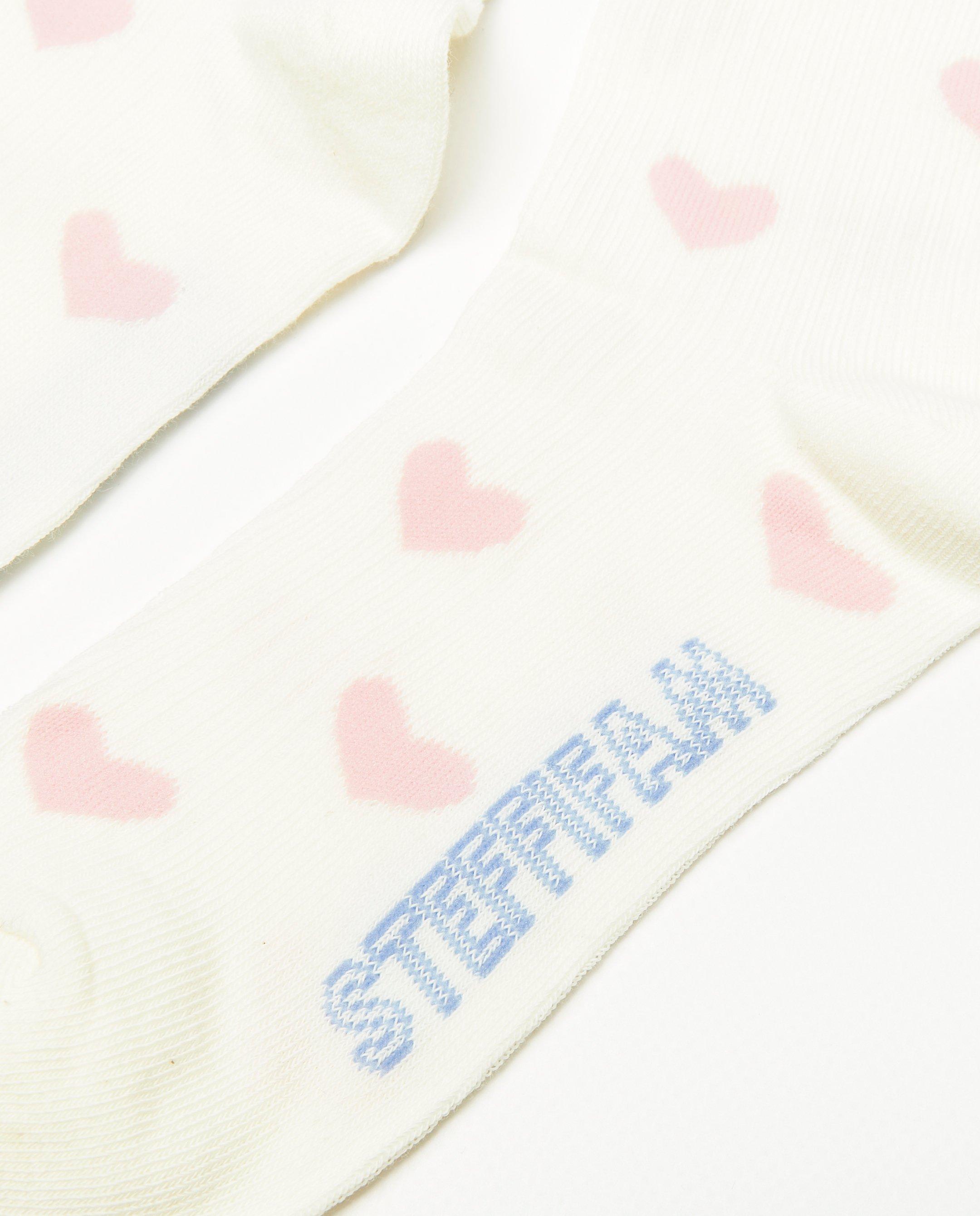 Chaussettes - Chaussettes avec un motif à petits cœurs