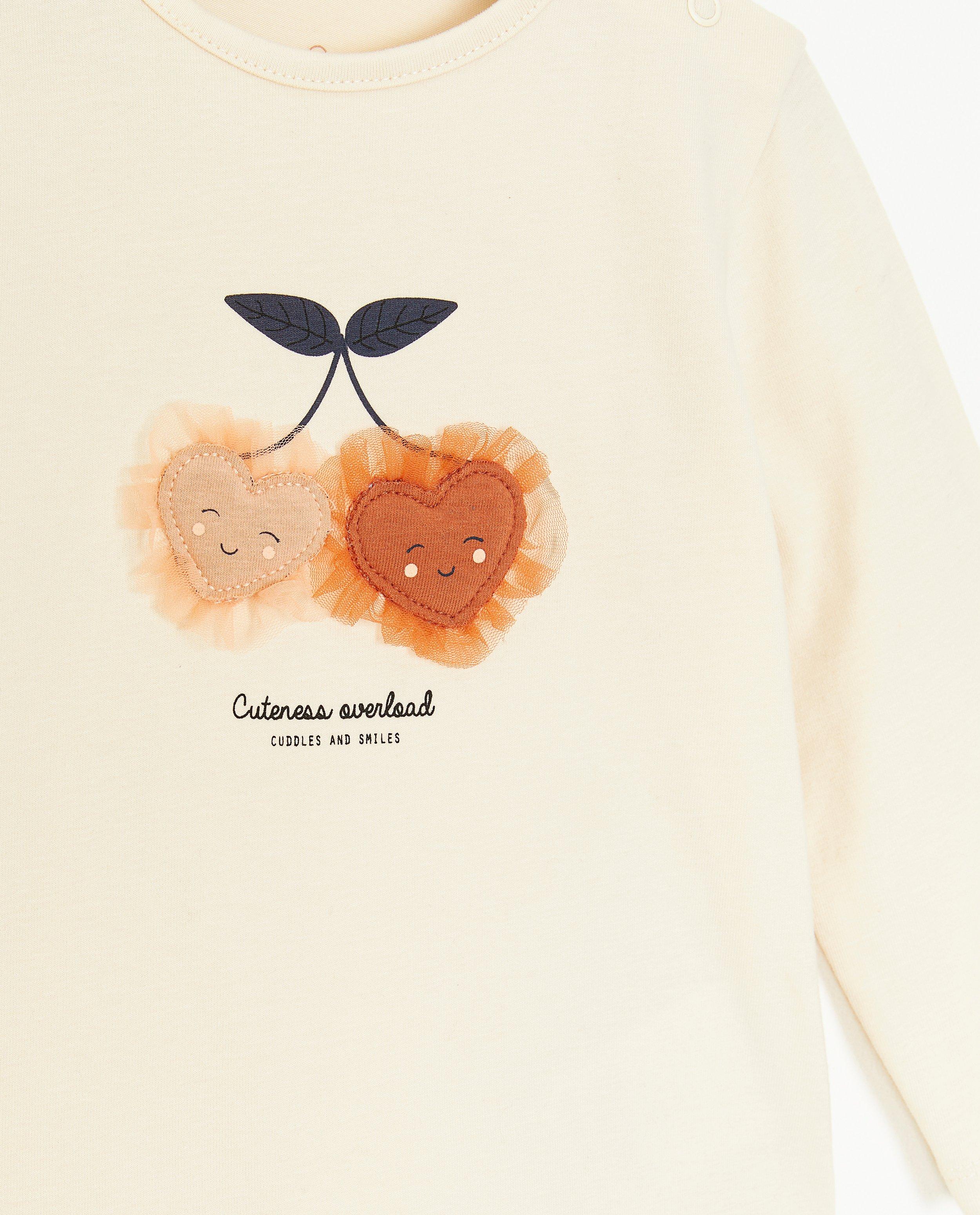 T-shirts - Ecru longsleeve met reliëfprint