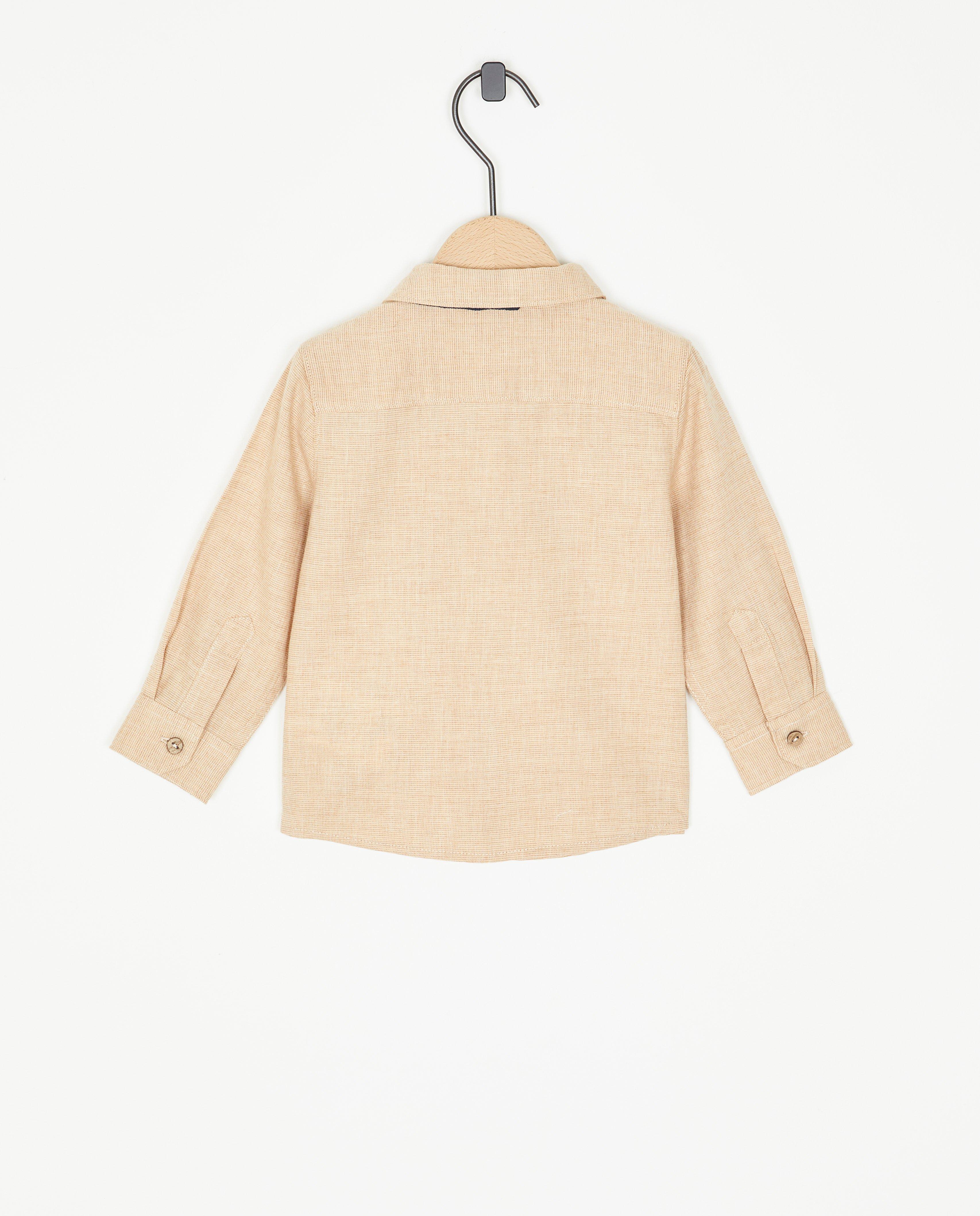 Chemises - Chemise bleue avec un nœud tricoté