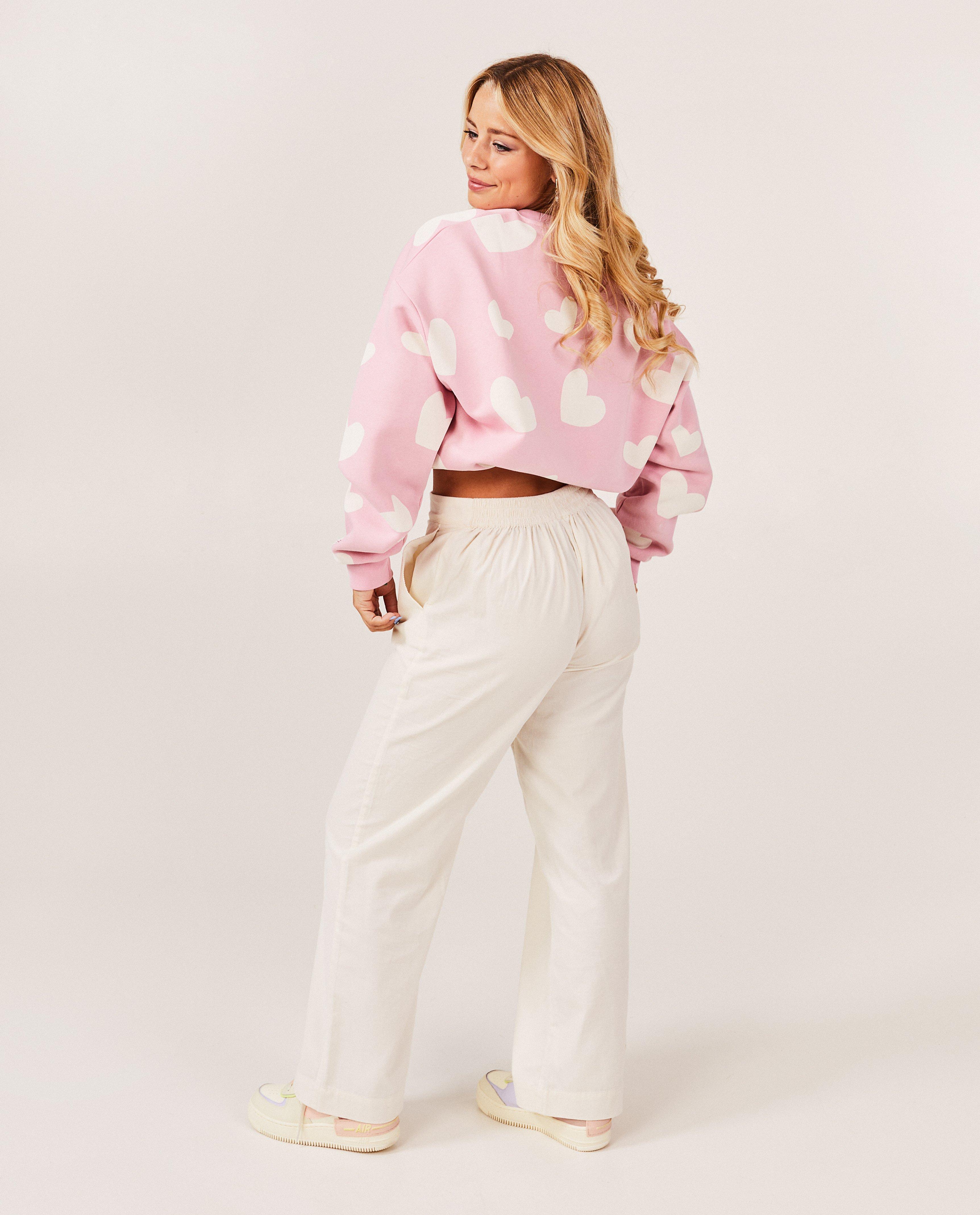Sweaters - Roze sweater met hartjespatroon